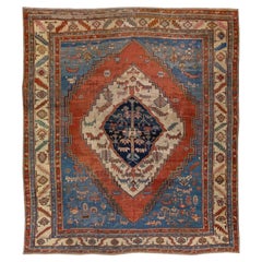 Blauer antiker persischer handgefertigter Bakshaish-Wollteppich mit Medaillon-Motiv in Blau