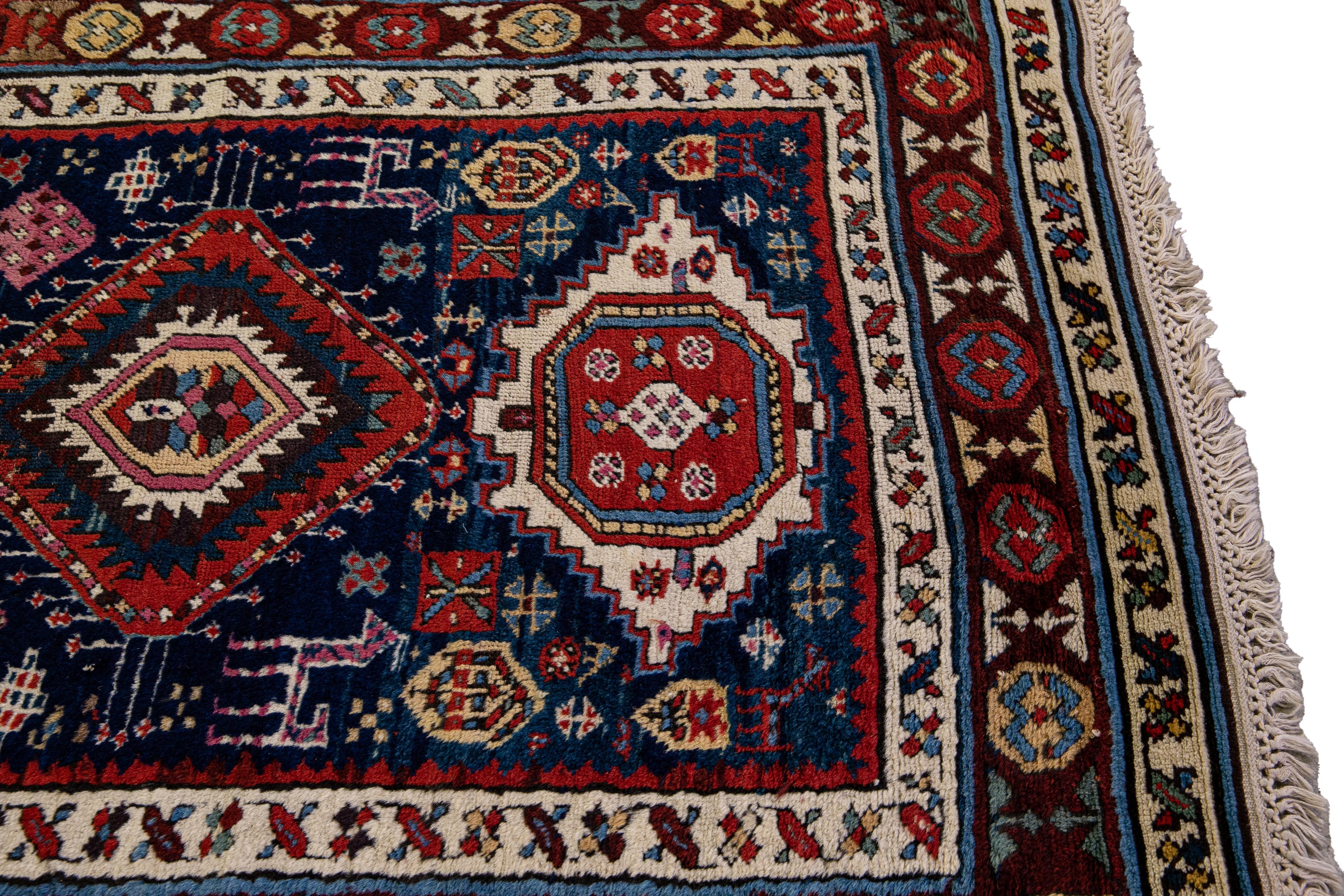Early 20th Century Blue Antique North West Persian Wool Runner With Tribal Motif For Sale