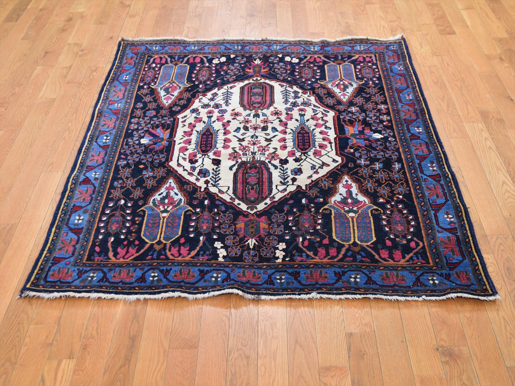 This is a truly genuine one-of-a-kind blue antique Persian Afshar even wear hand knotted Oriental rug. It has been knotted for months and months in the centuries-old Persian weaving craftsmanship techniques by expert artisans.

Primary materials: