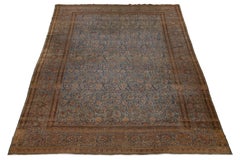 Blauer antiker persischer Kashan Wollteppich handgefertigt mit floralem Muster