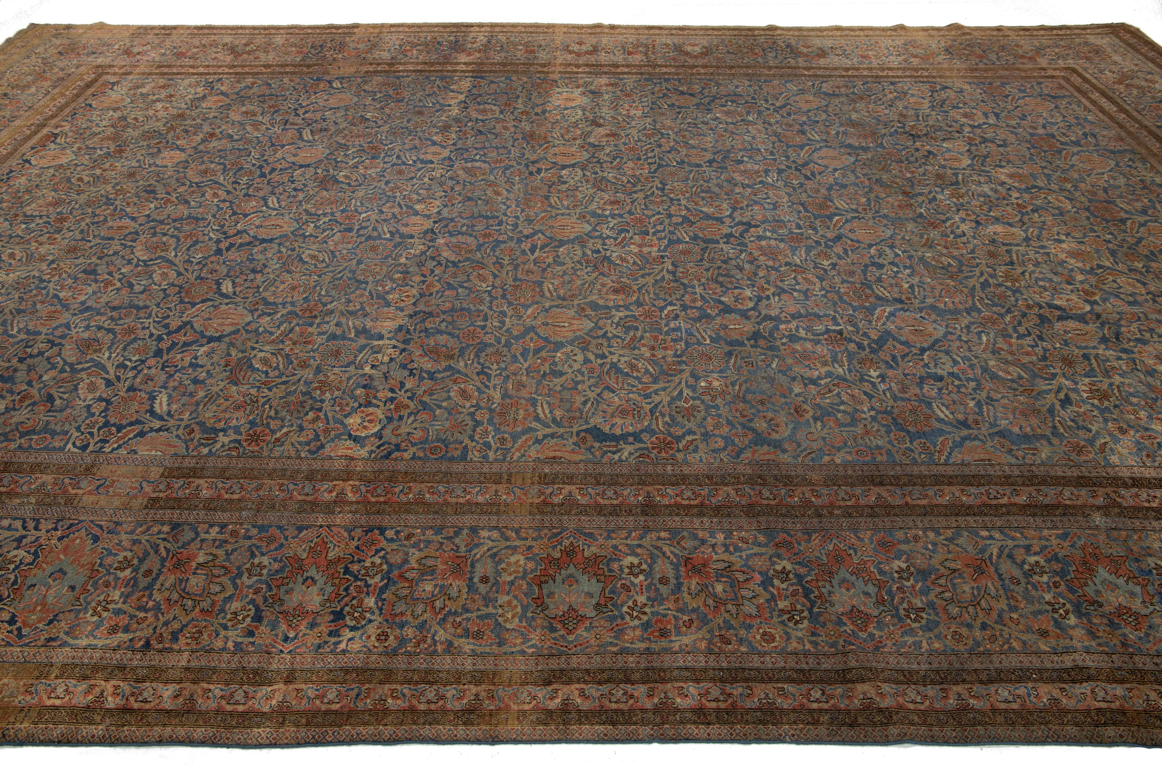 XIXe siècle Tapis persan ancien en laine de Kashan bleu, fabriqué à la main avec un motif floral en vente