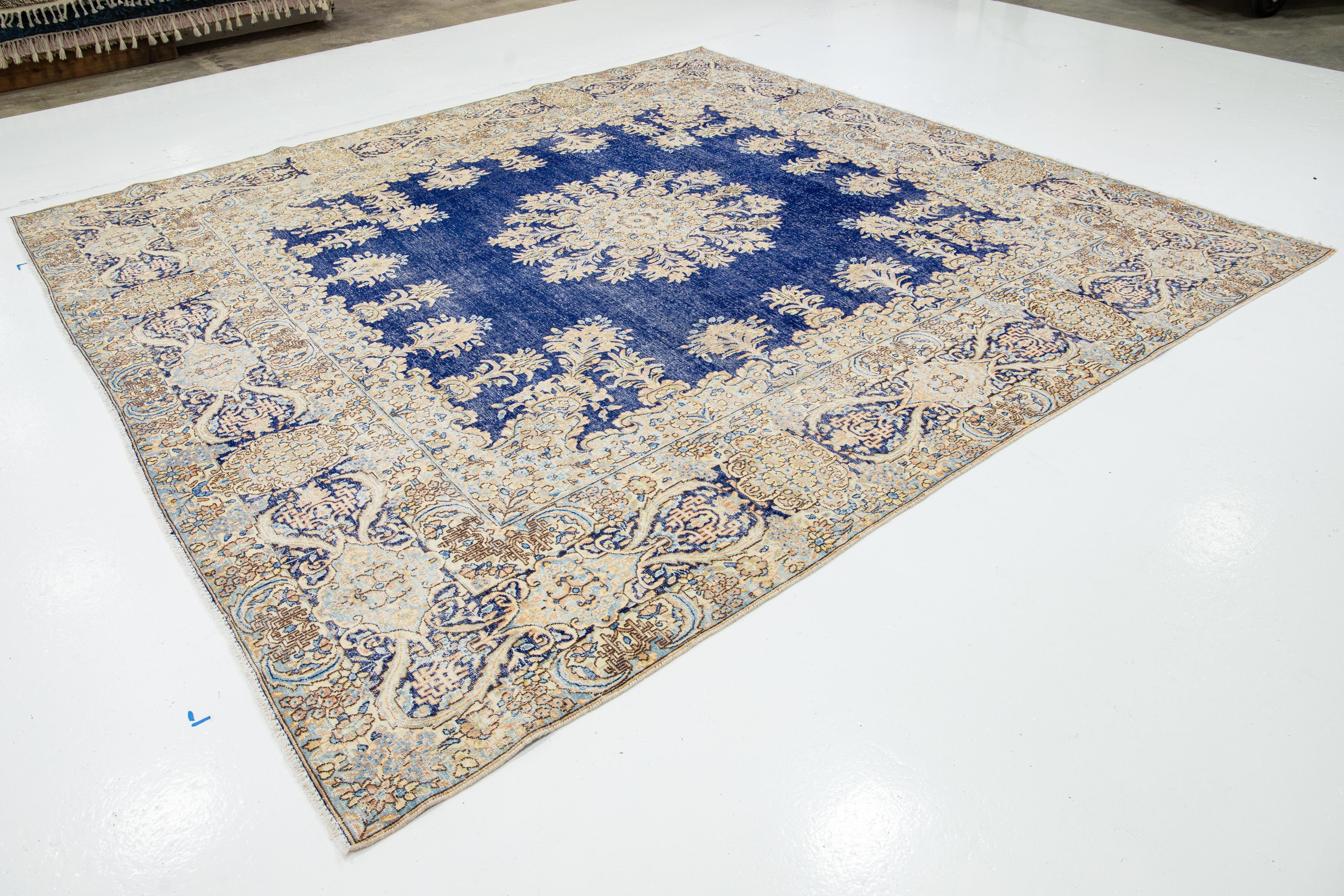 Blue Antique Persian Kerman Square  Wool Rug Handmade Featuring a Rosette Motif  In Good Condition For Sale In Norwalk, CT