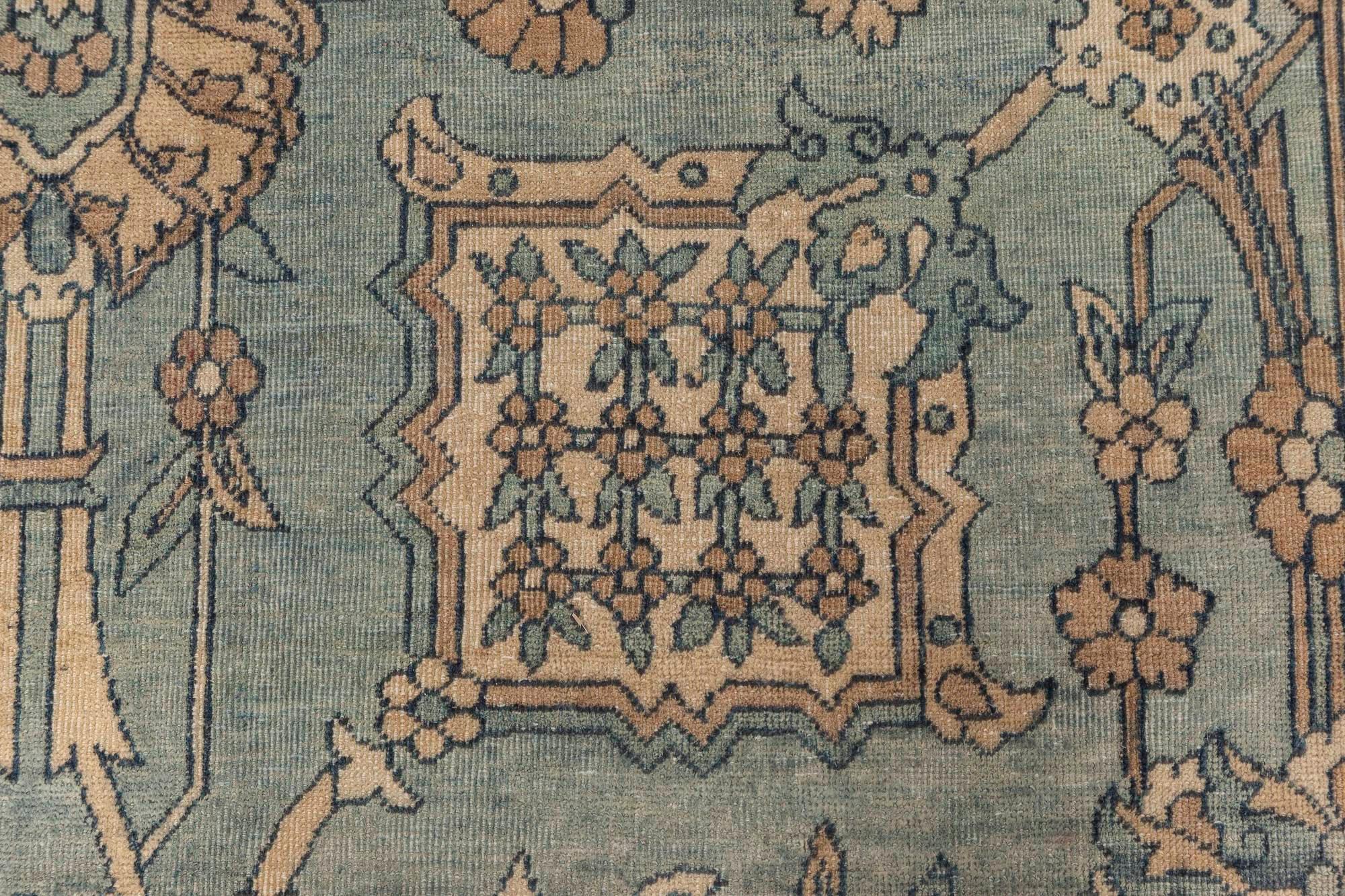 Blue antique Persian Kirman rug
Size: 11'6