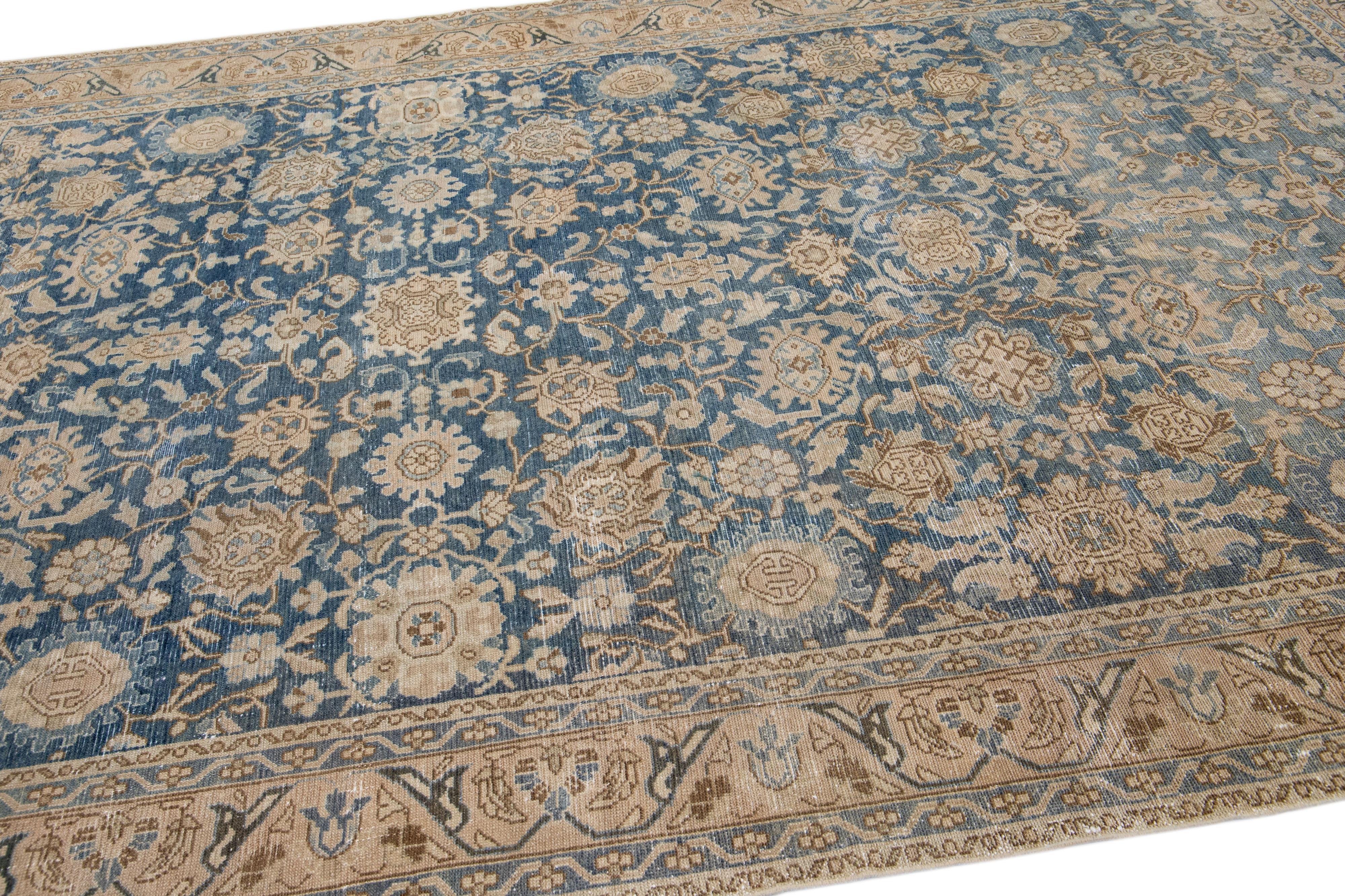 20th Century Blue Antique Persian Malayer Handmade Wool Rug with Allover Floral Design For Sale