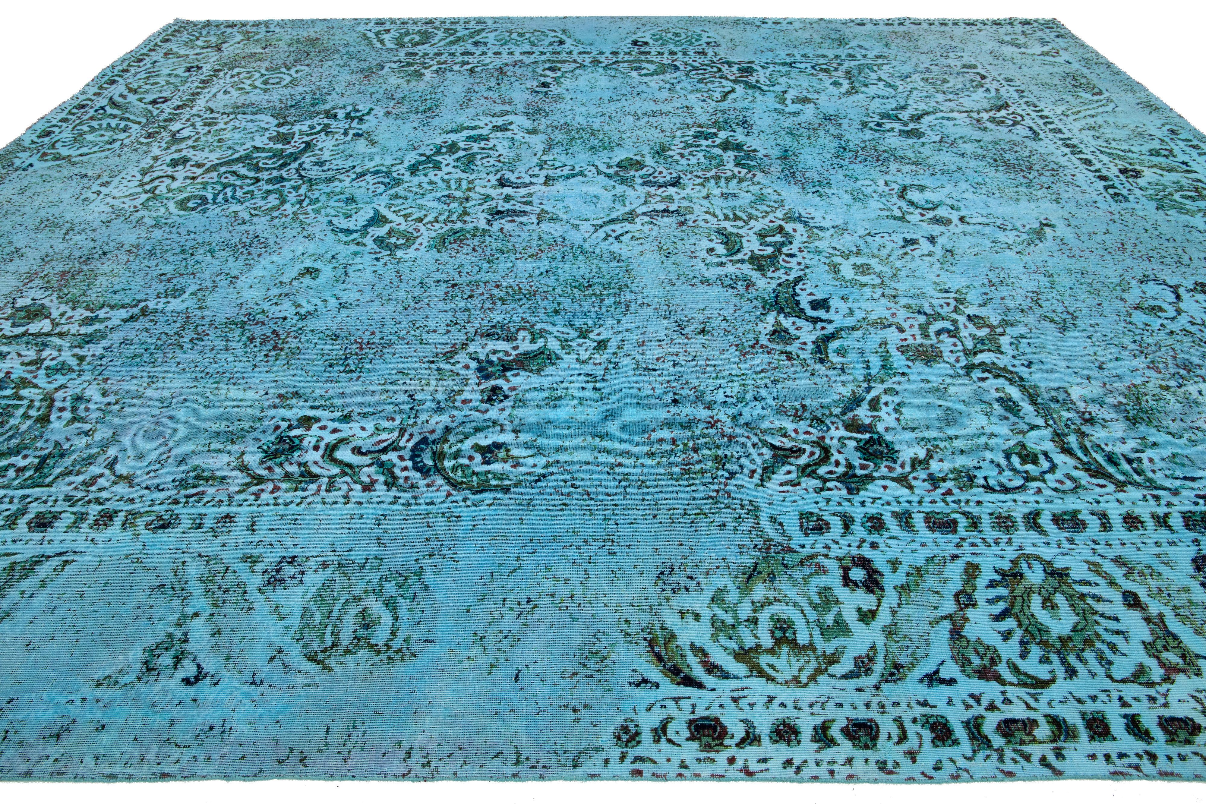 20th Century Blue Antique Persian Overdyed Wool Rug With Allover Motif For Sale