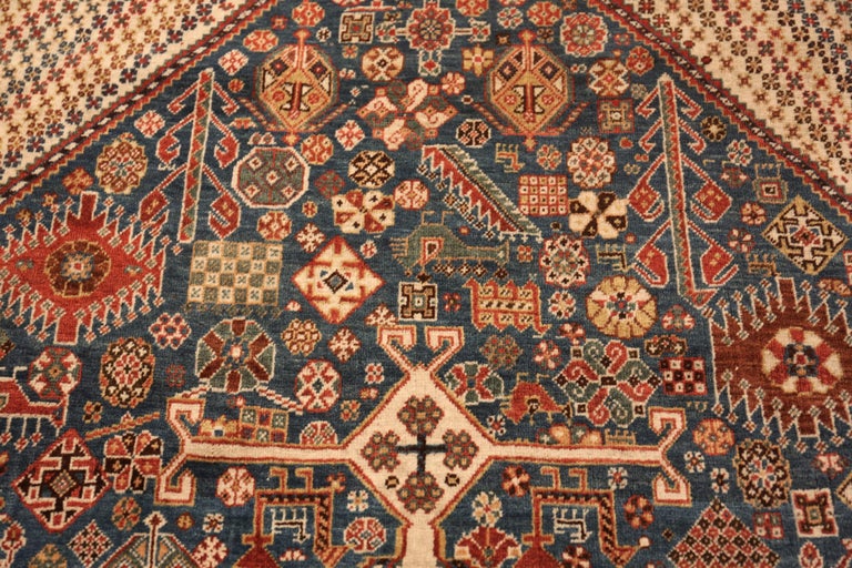 Wool Blue Antique Persian Qashqai Rug. Size: 4 ft 10 in x 7 ft 2 in For Sale