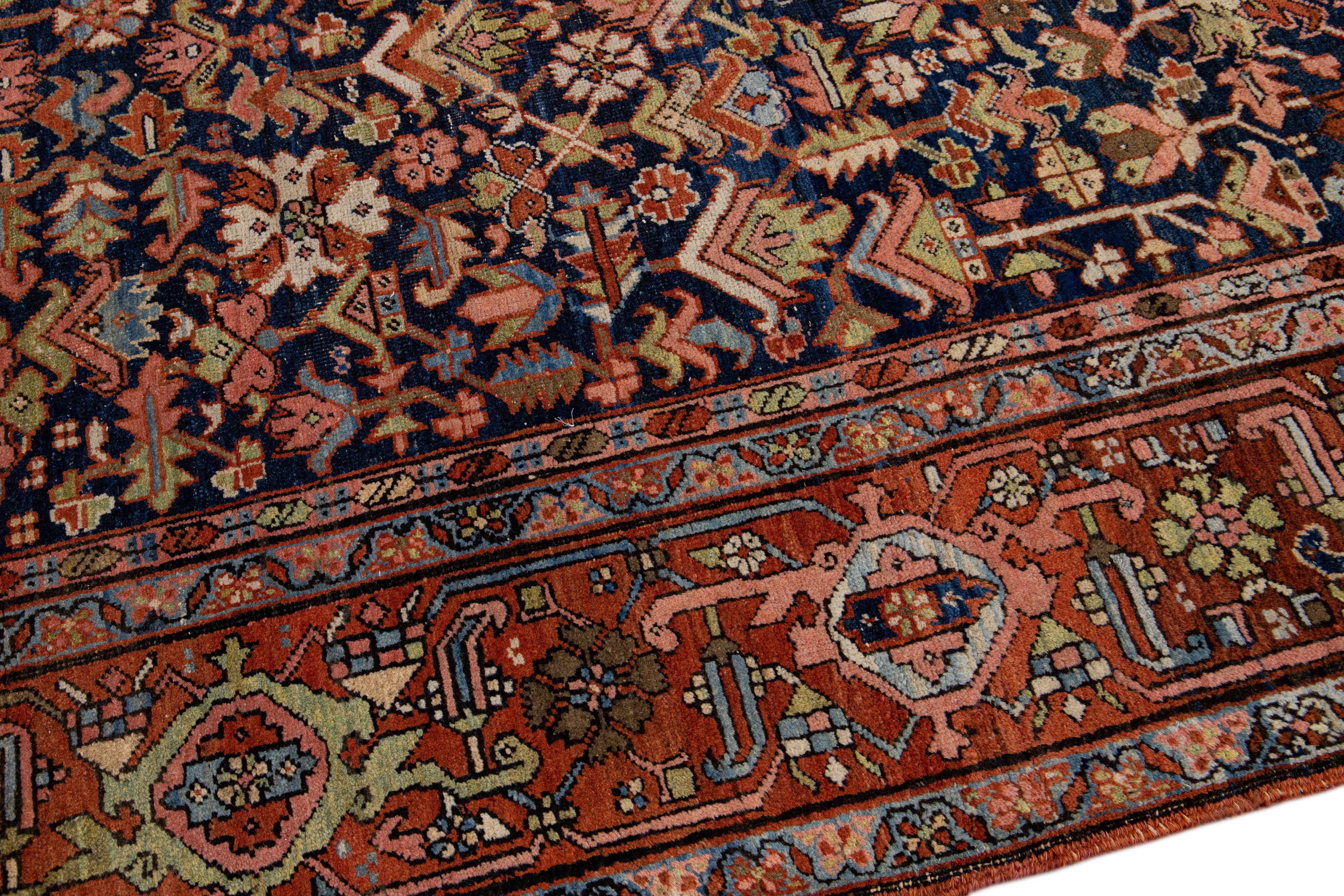 20th Century Blue Antique Persian Serapi Handmade Wool Rug with Allover Floral Pattern For Sale