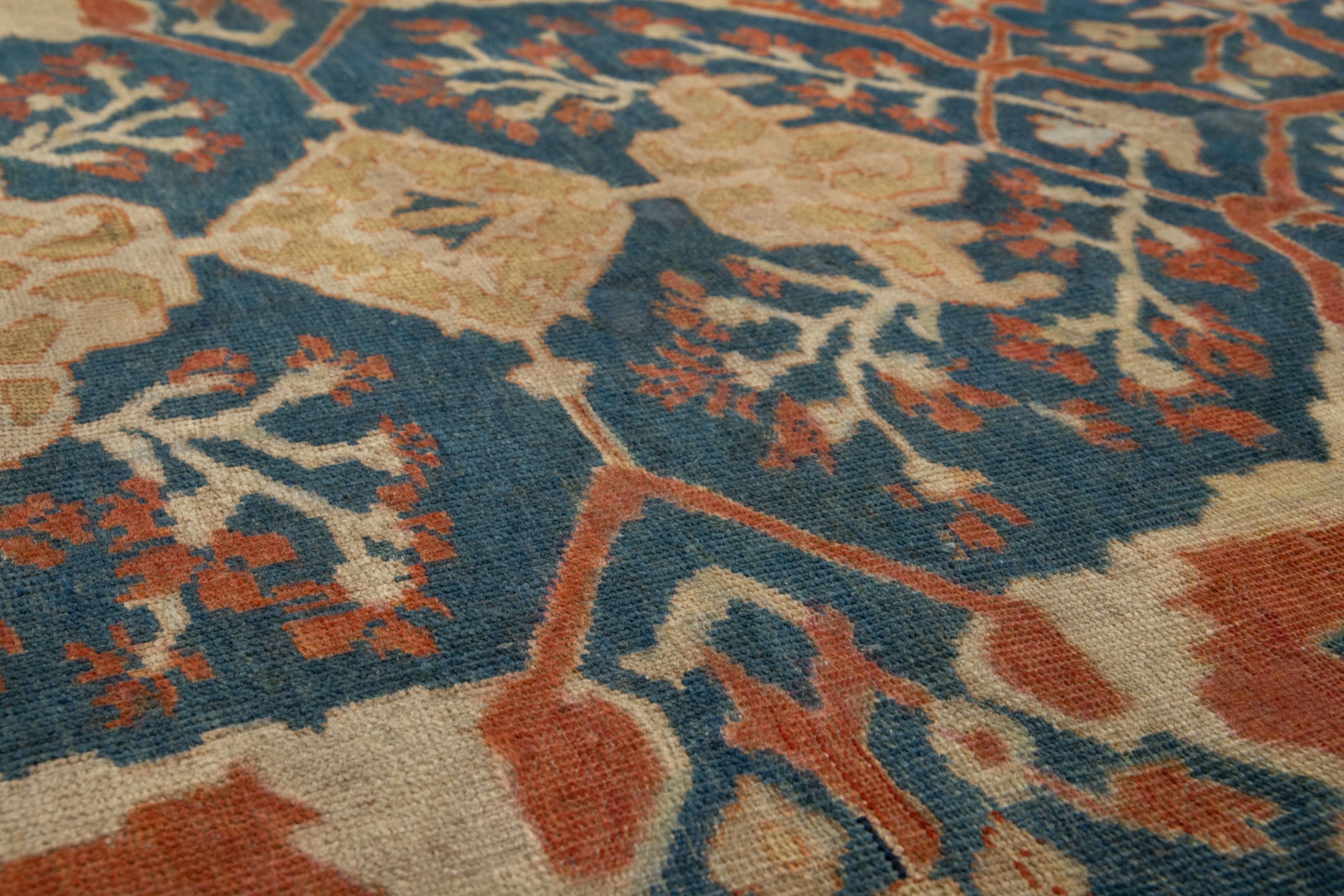 Perse Tapis persan ancien Sultanabad en laine bleu, fabriqué à la main, datant des années 1900 en vente