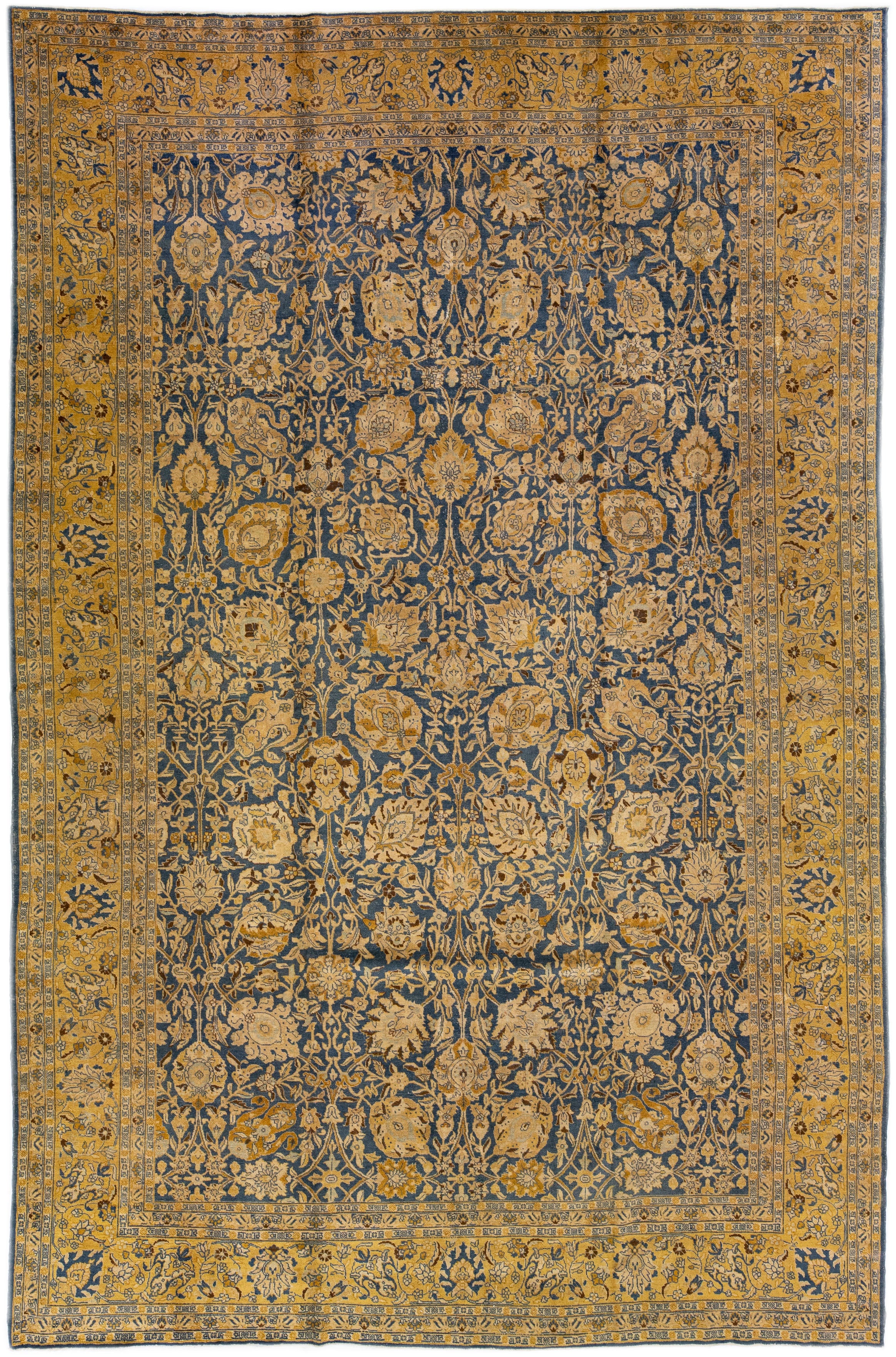 Tapis persan ancien en laine bleu de Tabriz, fait à la main, à motifs floraux surdimensionnés