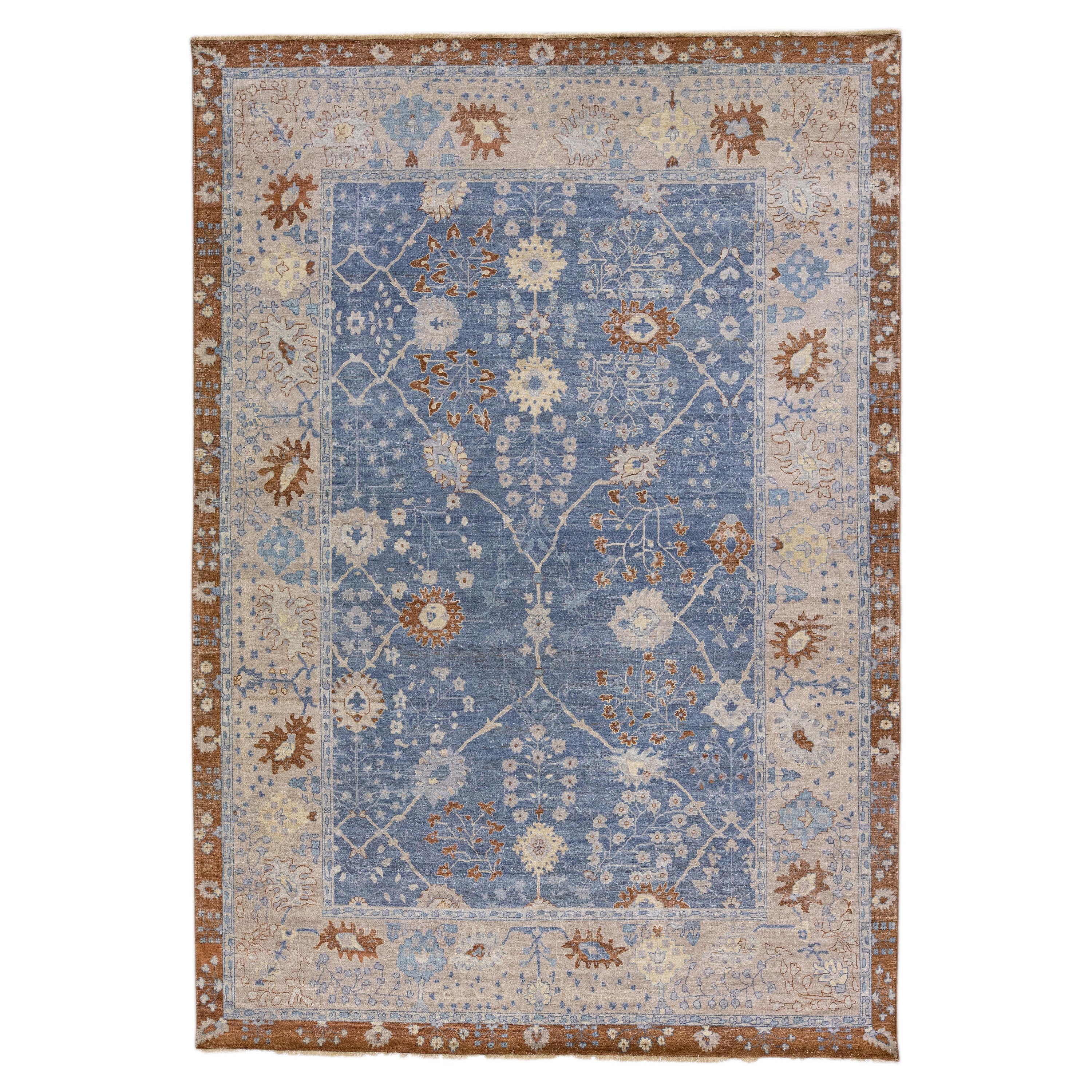 Tapis en laine bleu de la collection artisanale Apadana, fabriqué à la main et entièrement conçu