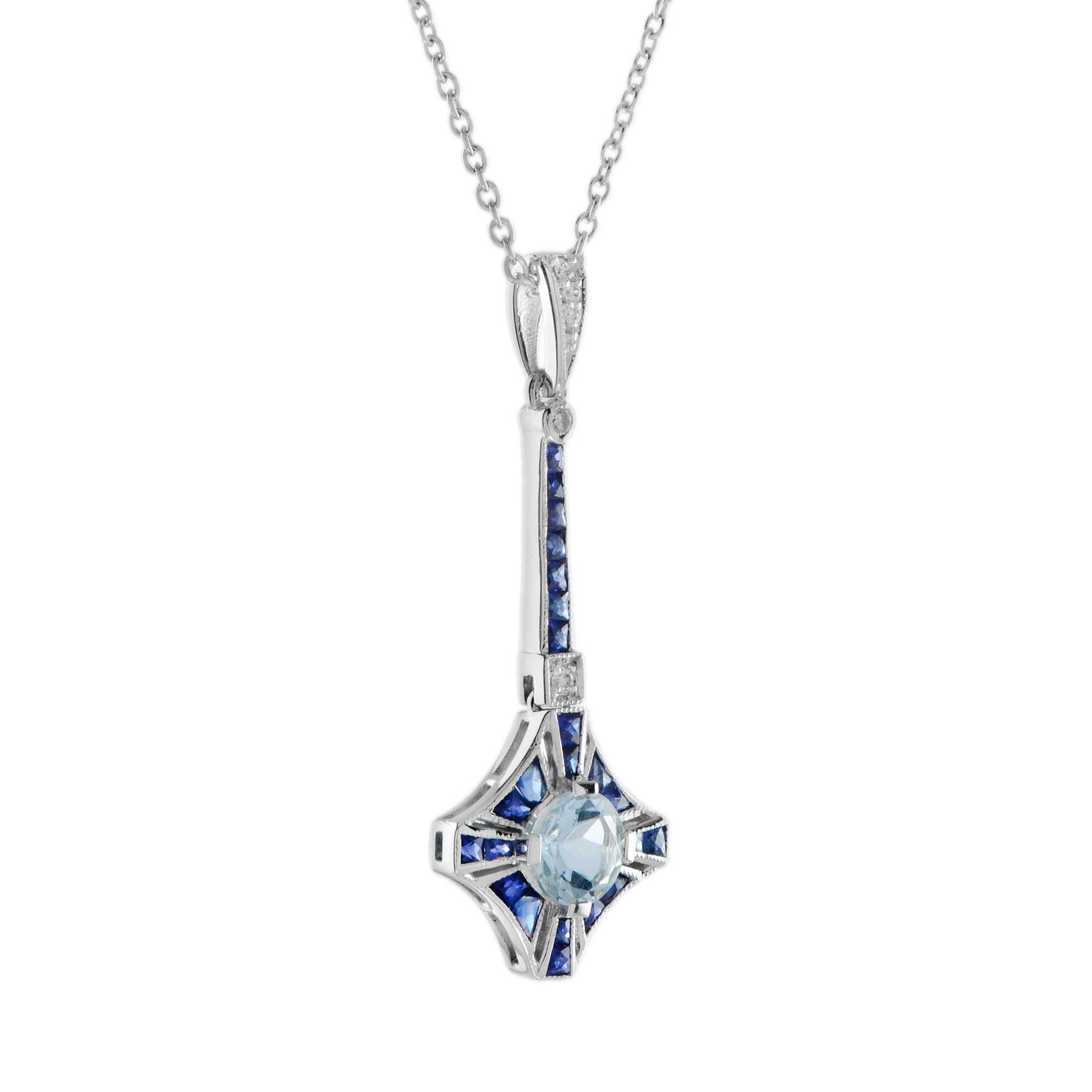 A classic beauty of yesteryear. This Art Deco inspired pendant features a round aquamarine, surrounded by French cut blue sapphires and diamonds on the its top part. The pendant is set in gold with exquisite milgrain detail. 18K White Gold.