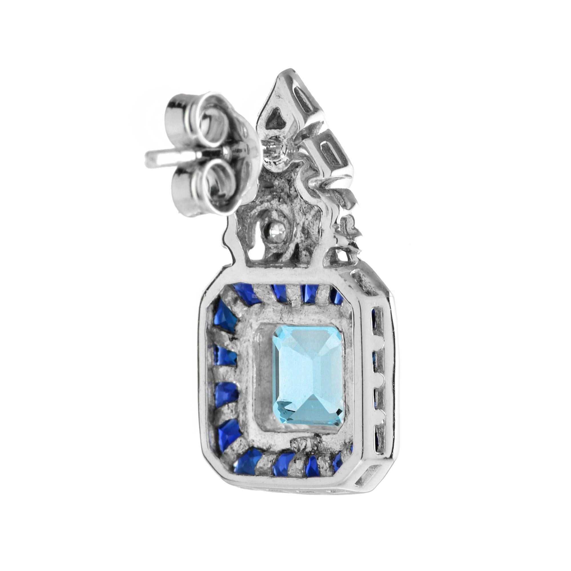 A pair of vintage aquamarine drop earrings, each earring consisted of an emerald cut aquamarine surround by a row of French cut sapphires, suspended from a round diamond-set top. These eye-catching earrings would pair perfectly with a sleek cocktail