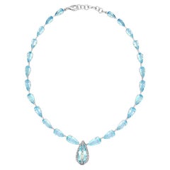Collana con acquamarina blu e diamanti bianchi in oro bianco 18 carati con pettorale Princess