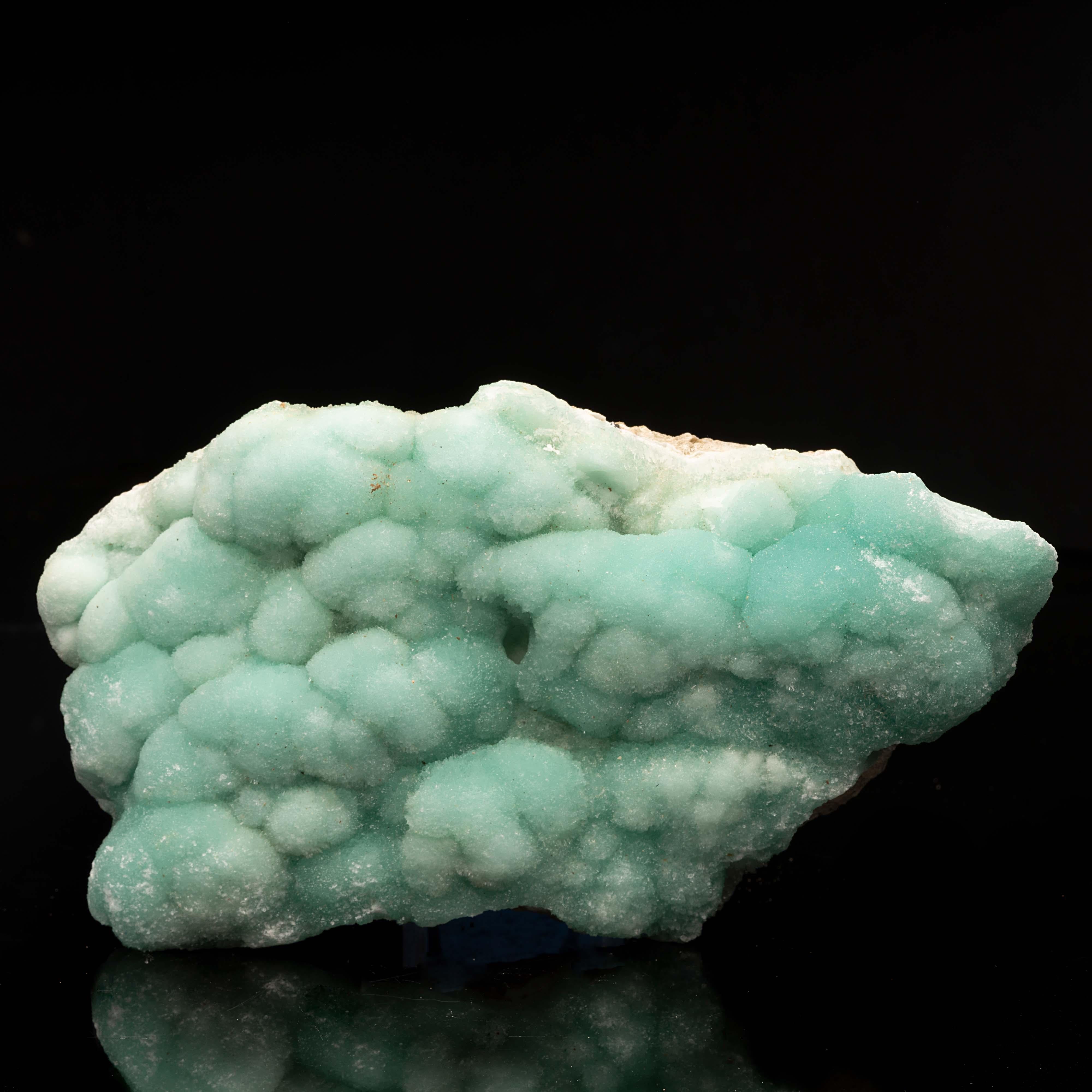 This piece is a uniquely special find perfect for the discerning mineral enthusiast. It's unusual to find pieces of this calcium carbonate mineral with such spectacular color and wonderful botryoidal crystal formation, not to mention the