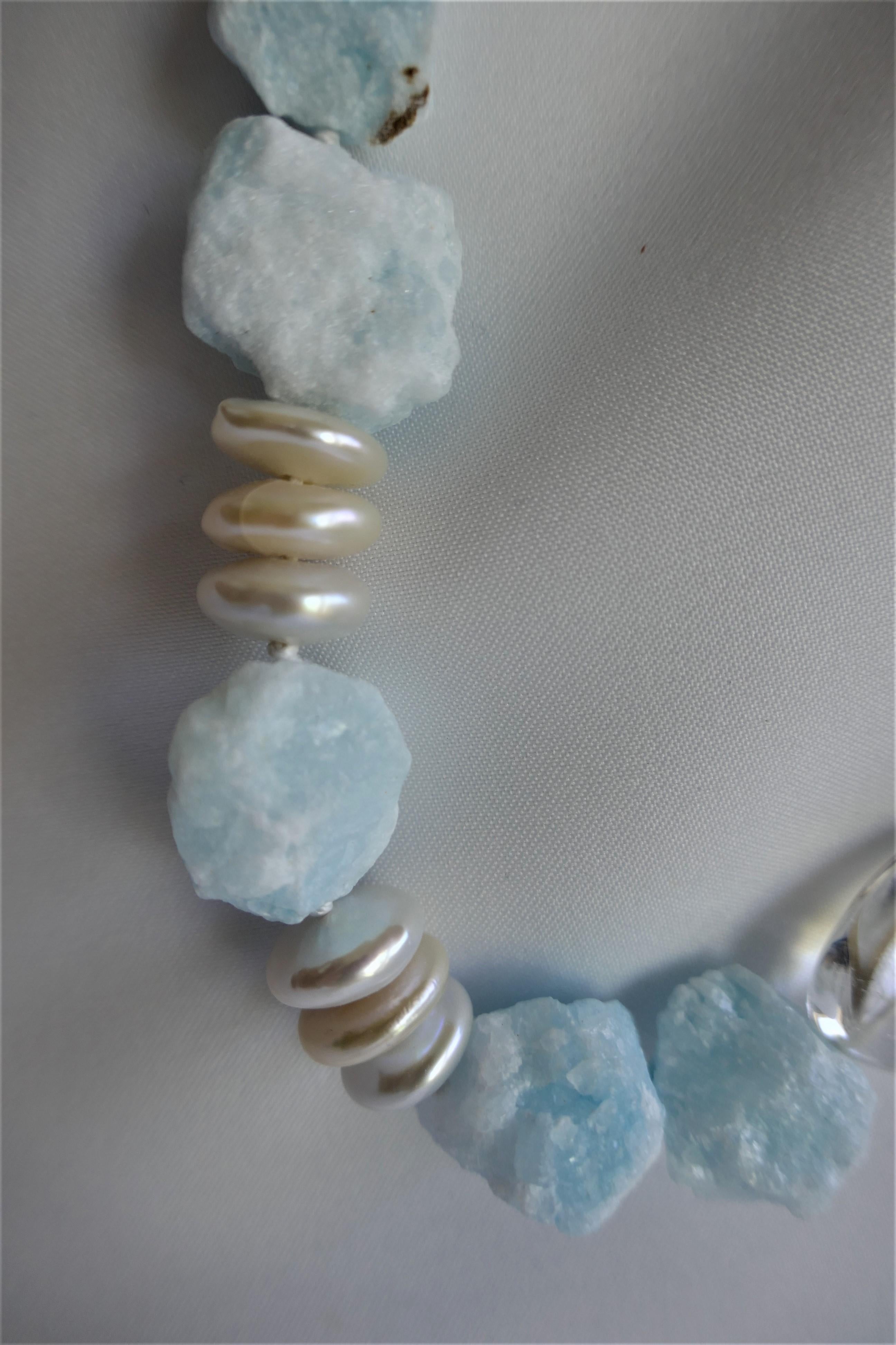 This necklace is very pretty in an understated way. The combination of the blue aragonite 15-16mm, with the white cultured pearls disks 12mm and the rock crystal nuggets give this necklace a lot of life. The clasp is 925 sterling silver.  The