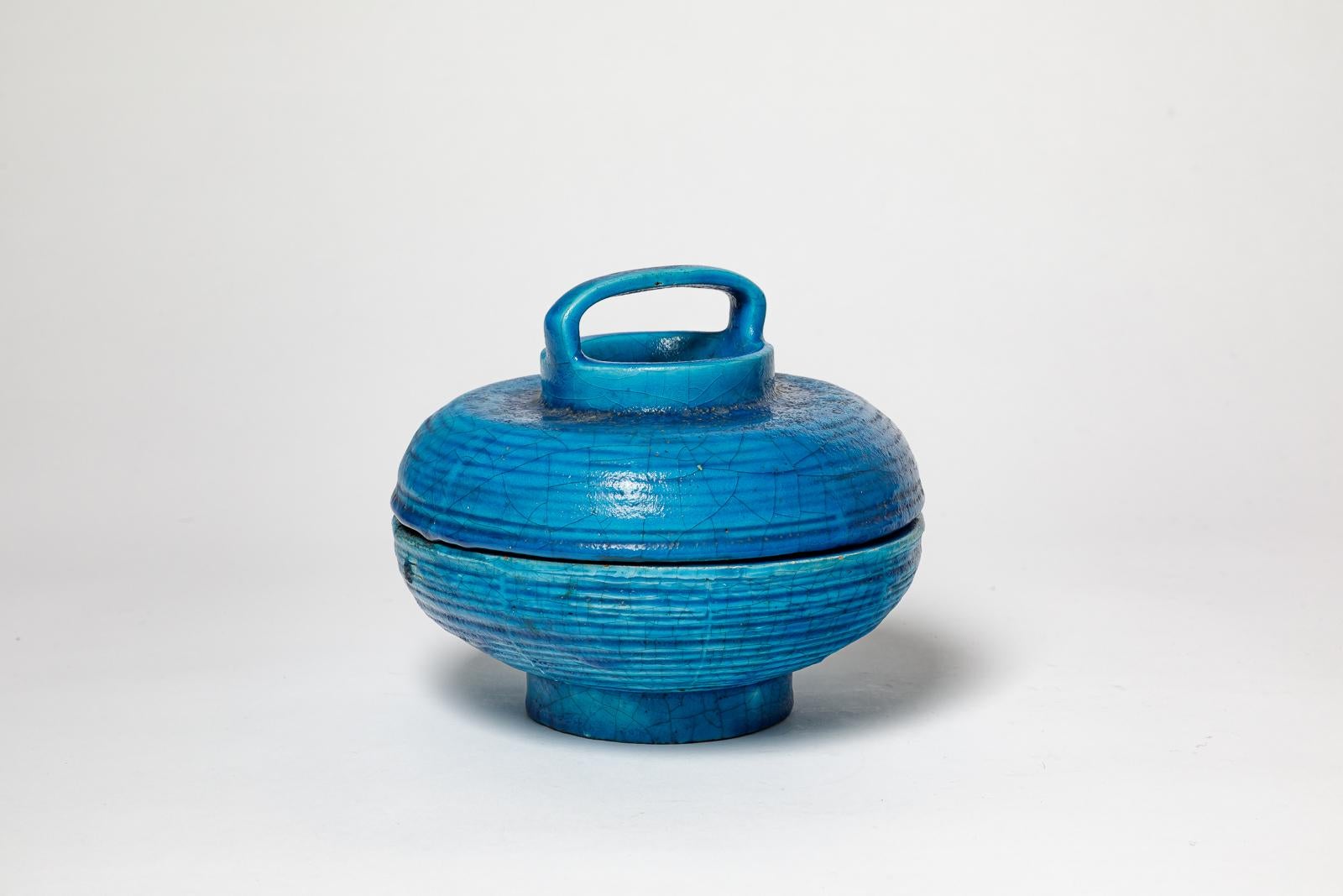 Edmond Lachenal 

Caja de cerámica decorativa o joyero art decó azul

cerámica de diseño del siglo xx 

Firmado

original perfecto estado

Altura 17 cm
Grande 18 cm