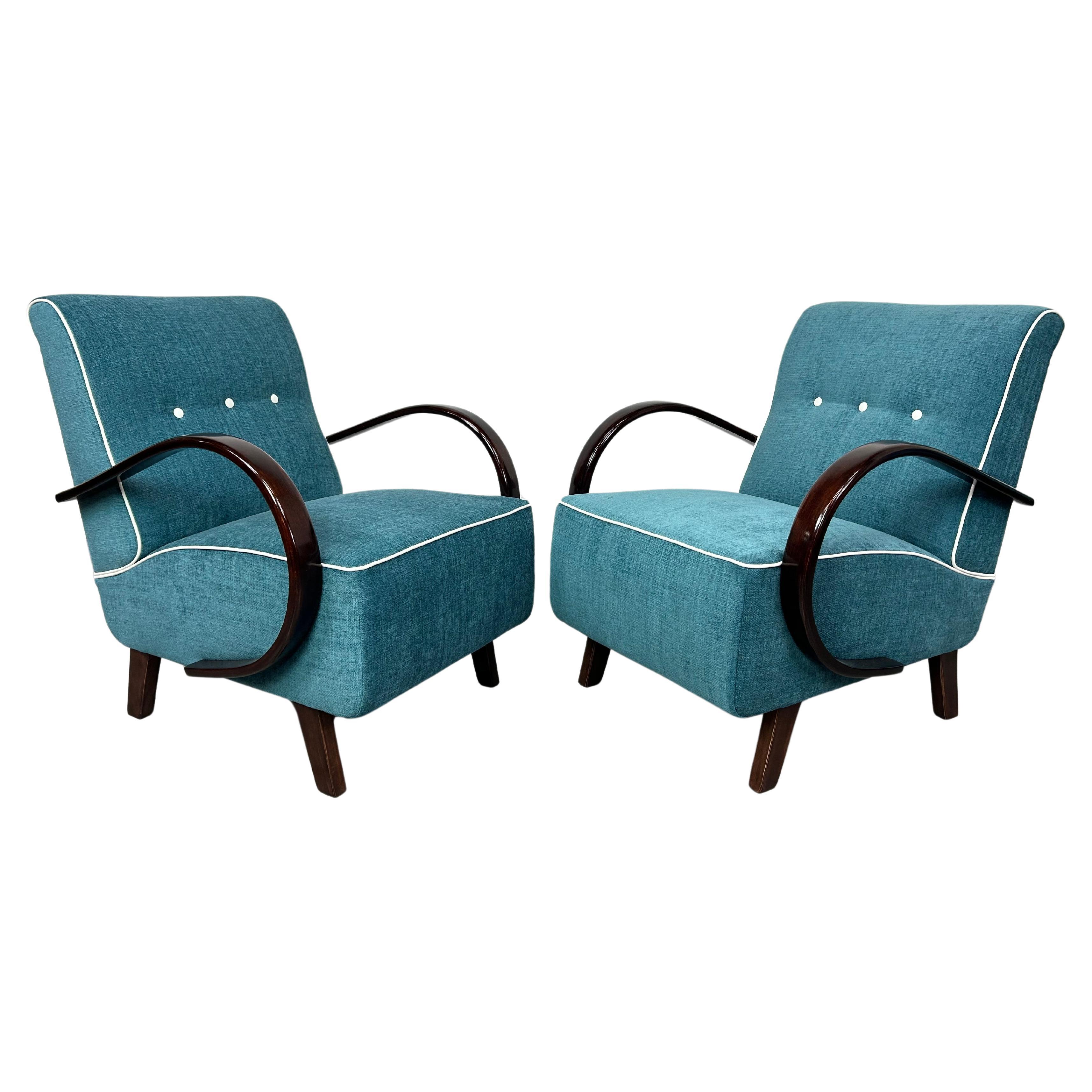Blue art deco armchairs by Jindřich Halabala