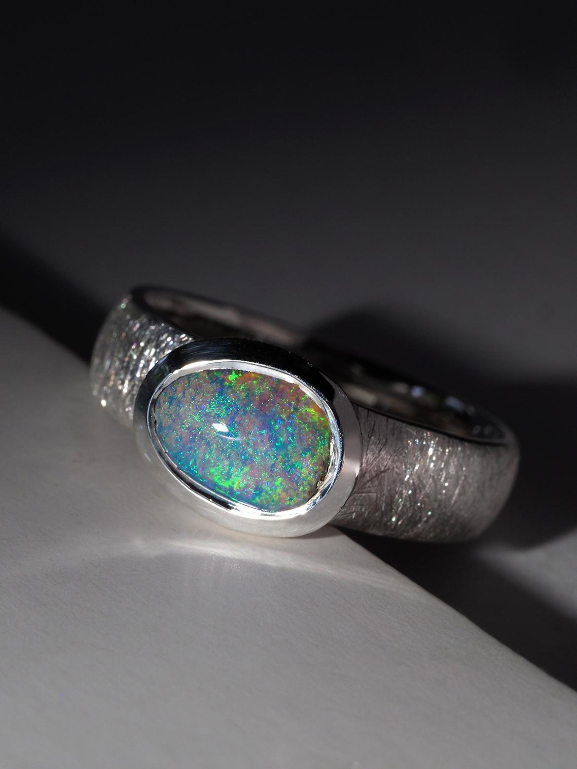 Boulder Opal silver ring
Opal origin - Australia 
size of the ring - 7 3/4 US, diameter 18 mm, N 16.5, 56.5 circumference
ring weight - 4.6 grams
stone measurements - 0.23 х 0.31 in / 6 х 8 mm

Worldwide shipping from Berlin, Germany. Prices include