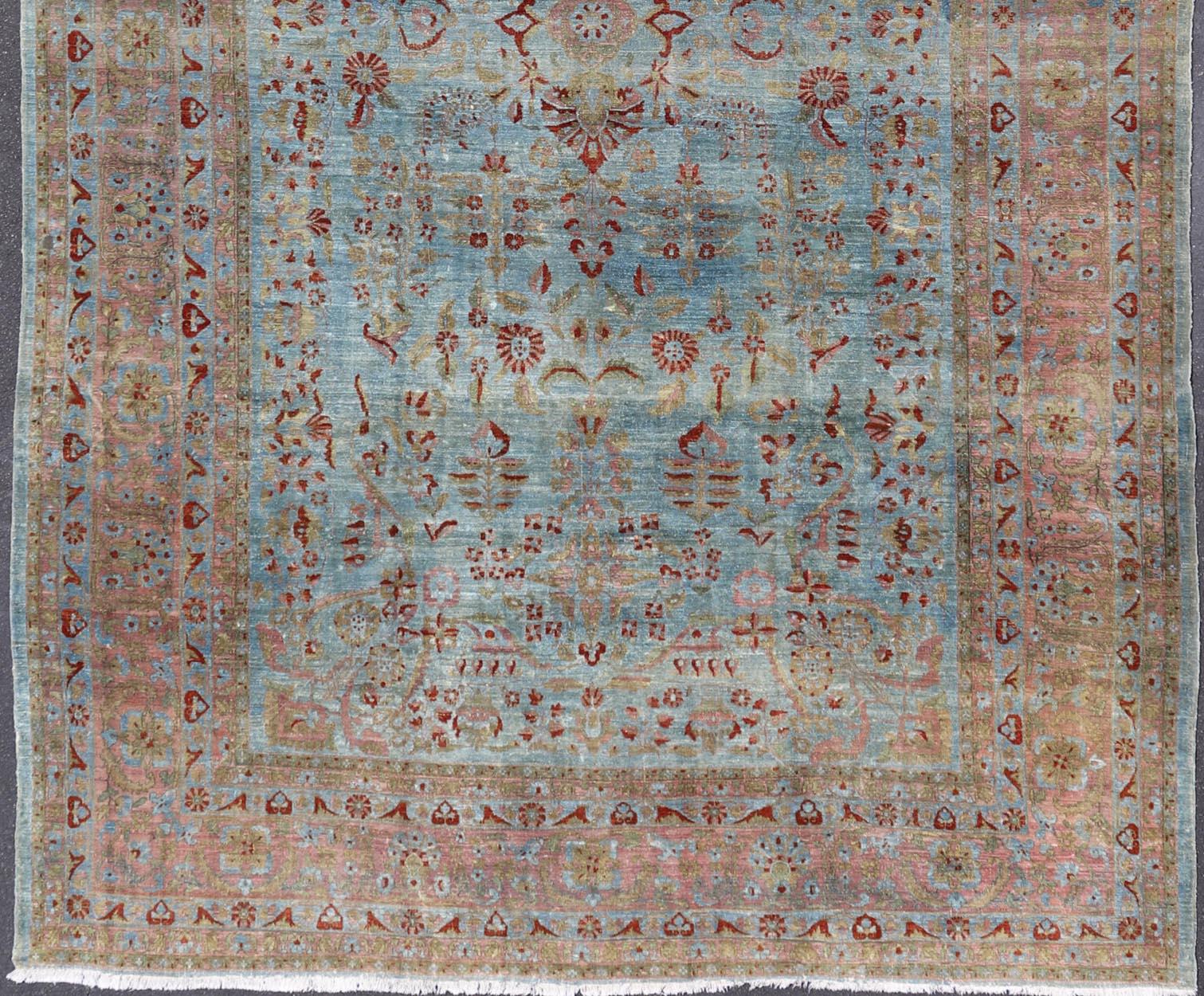 Sarouk Farahan Blue Background Antique Persian Mohajerah Rug with Salmon, Blue, Green, and Red For Sale