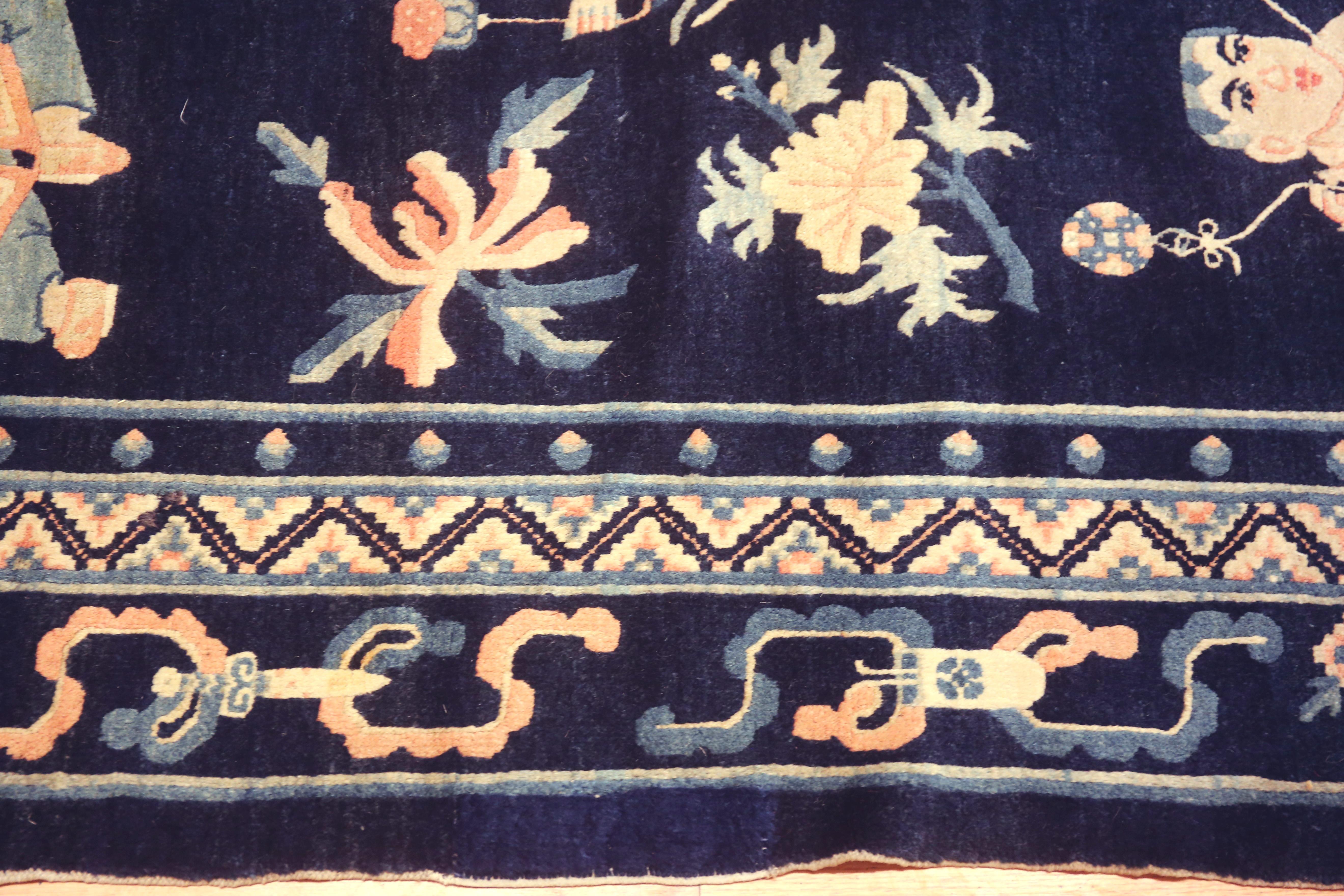 Beautiful Blue Background Figurative Design Antique Chinese Peking Rug, Country of origin: China, Circa date: 1900 