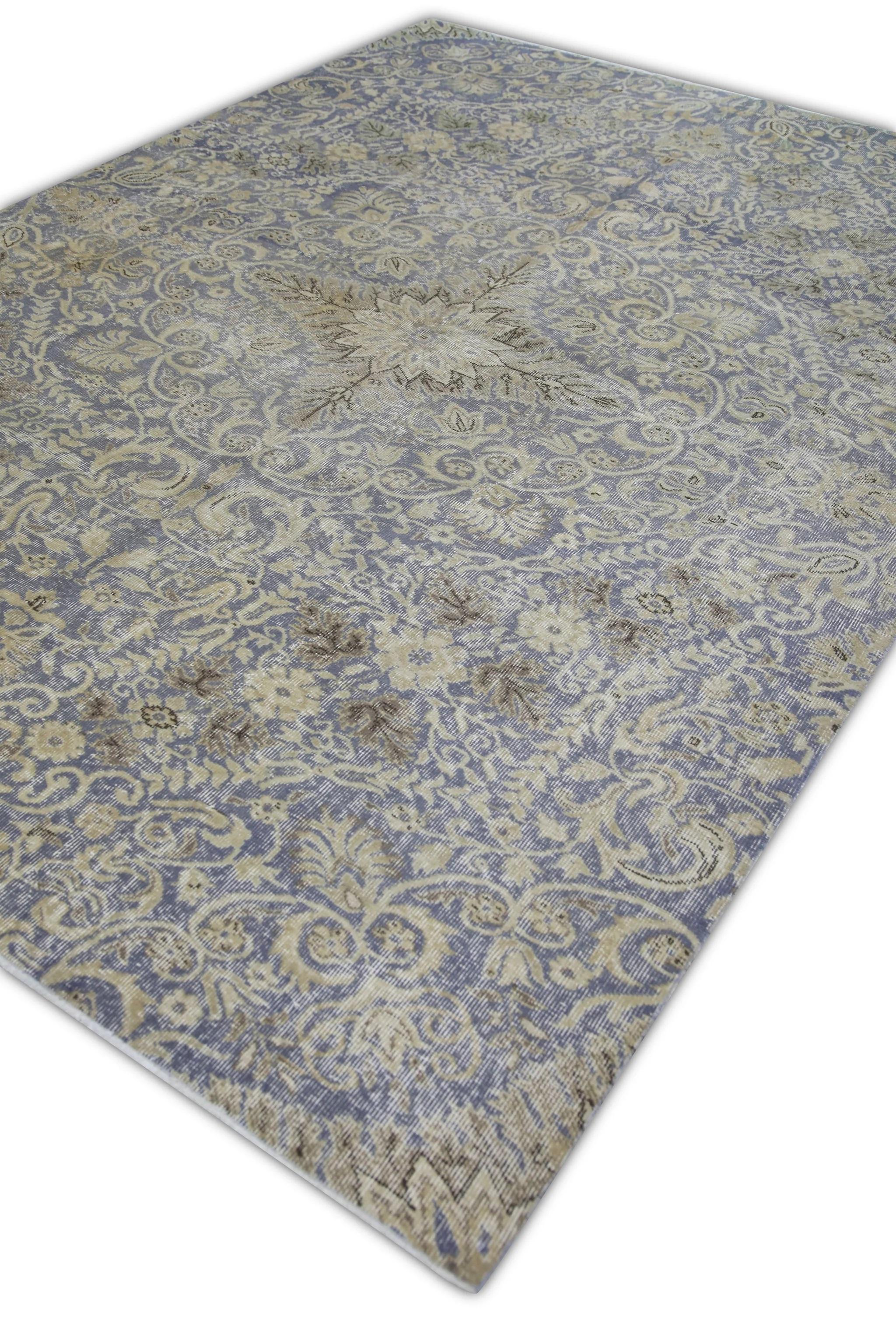 Introducing a one-of-a-kind vintage Turkish hand-knotted wool rug, carefully crafted by skilled artisans using traditional techniques passed down through generations. This exquisite rug boasts a stunning array of natural dyes, resulting in a rich