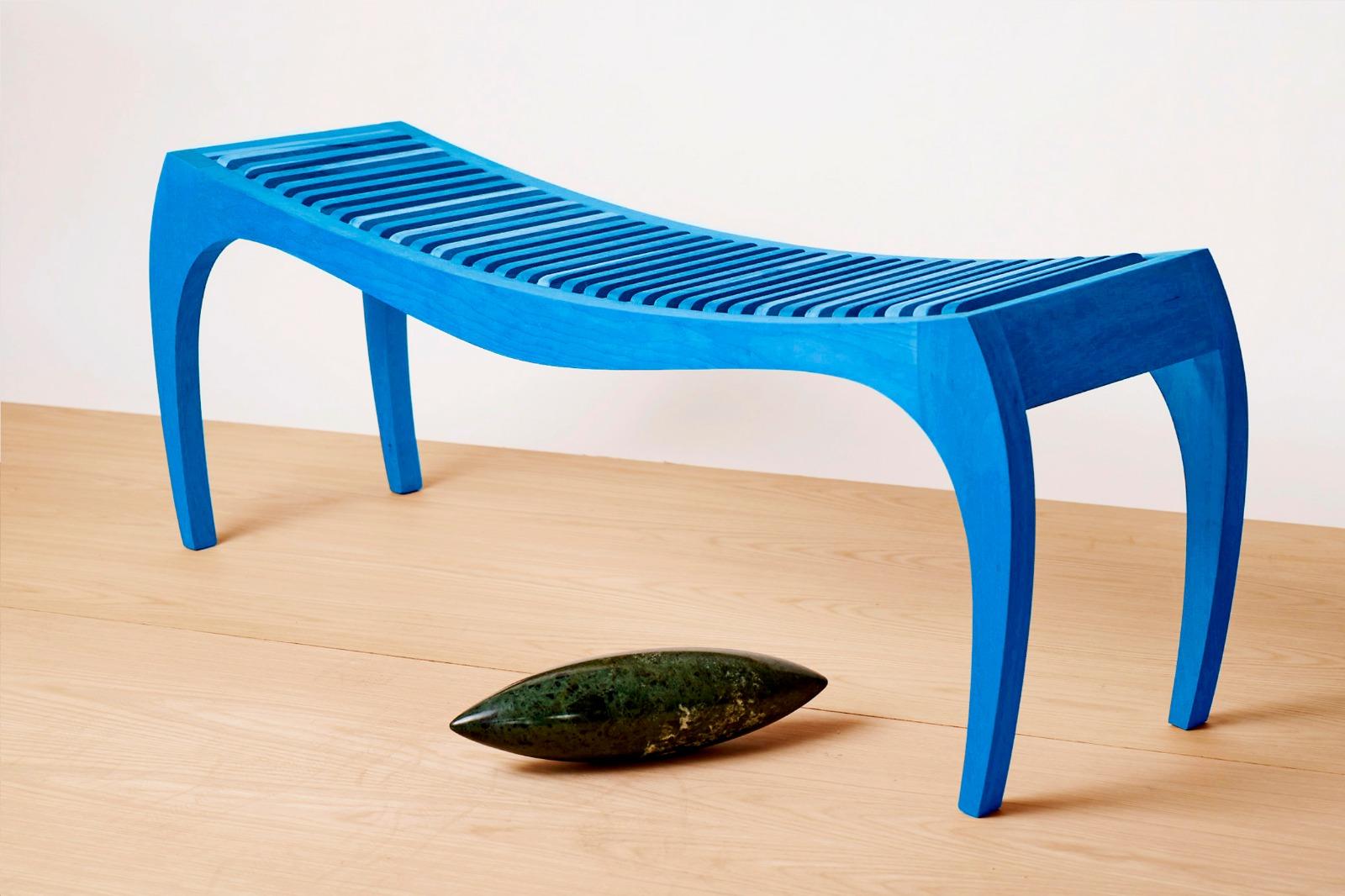 Blue bench rumbo by Jean-Baptiste Van den Heede
Unique piece signed and numbered
Dimensions: L 118 x H 42 x W 31 cm 
Materials: solid wood

Jean-Baptiste Van den Heede defines himself as a cabinetmaker-designer and an artist of academic