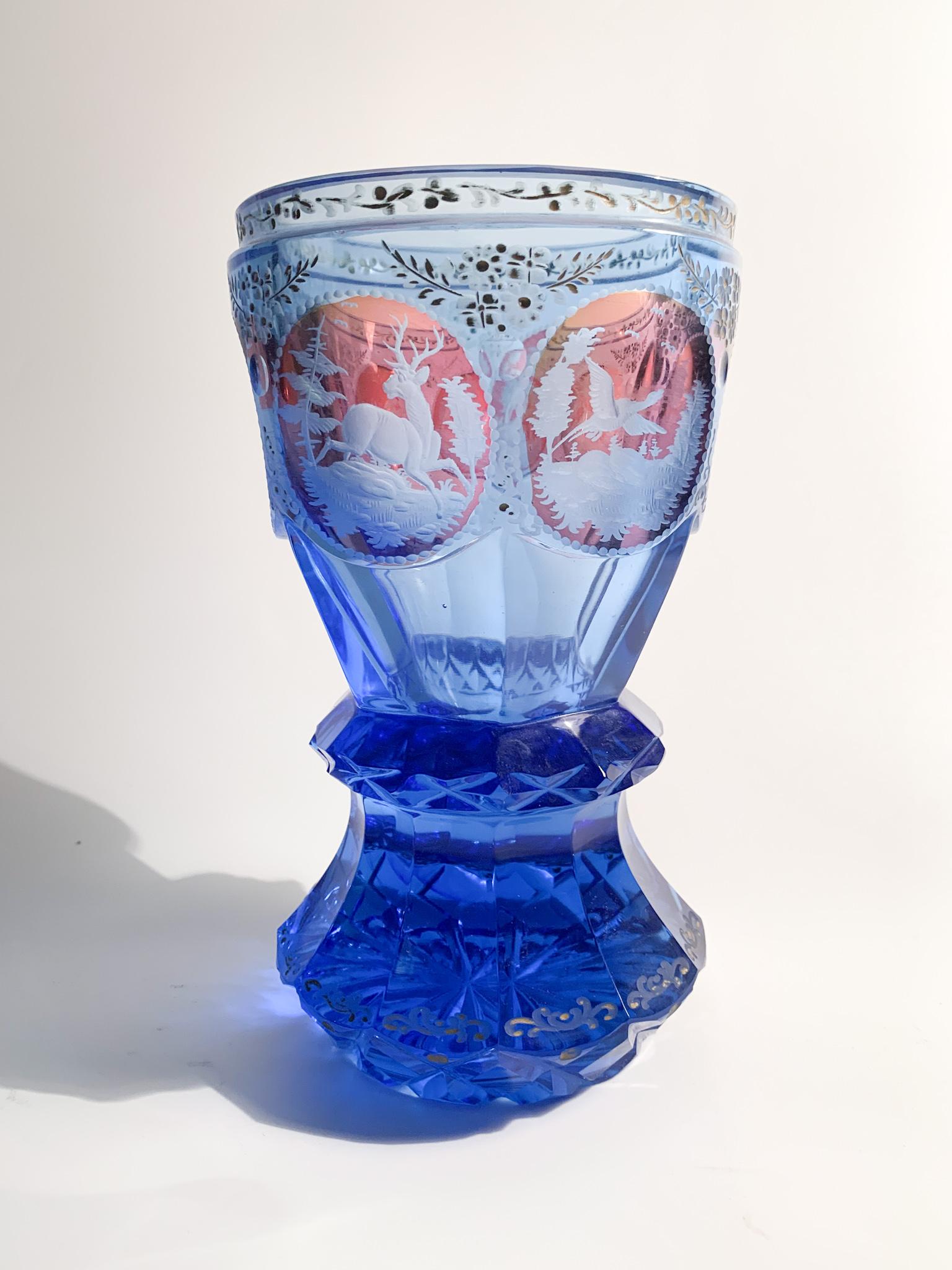 Blue Biedermeier crystal glass, decorated with acid and made in 1800.

Meaures: Ø cm 10 H cm 17.

Biedermeier is was an artistic movement that developed between 1815 and 1848. The term initially spread as a pejorative. Composed of two words: the