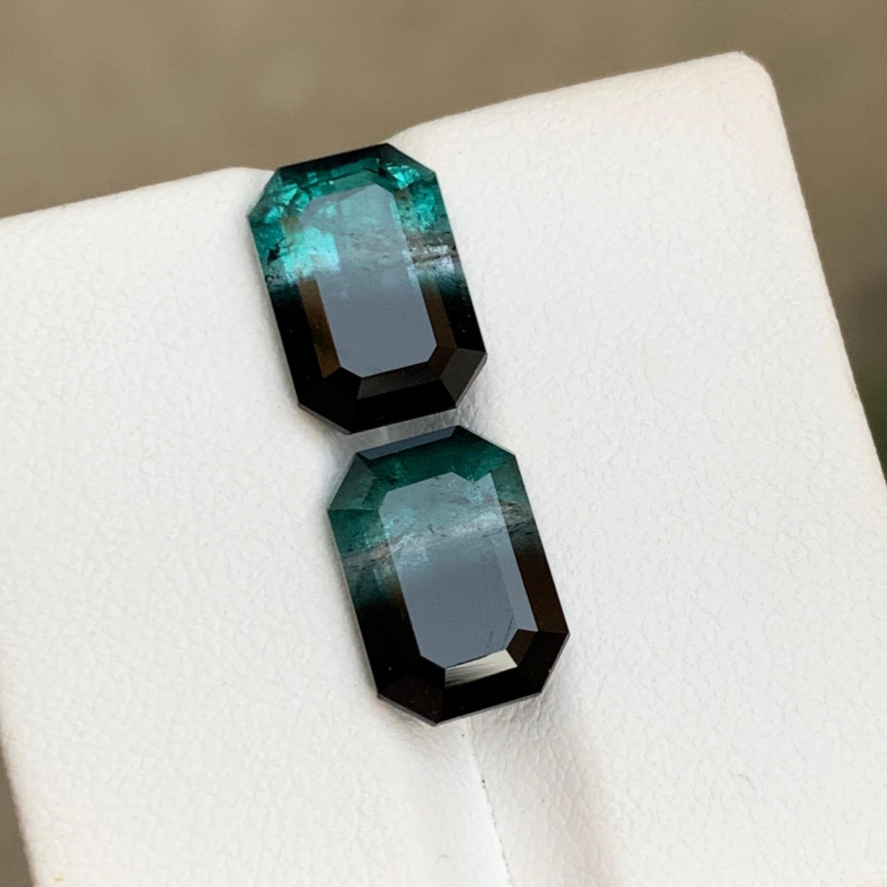 Contemporary Blue & Black Bicolor Tourmaline Gemstones Pair 8.85 Ct Emerald Cut for Earrings For Sale