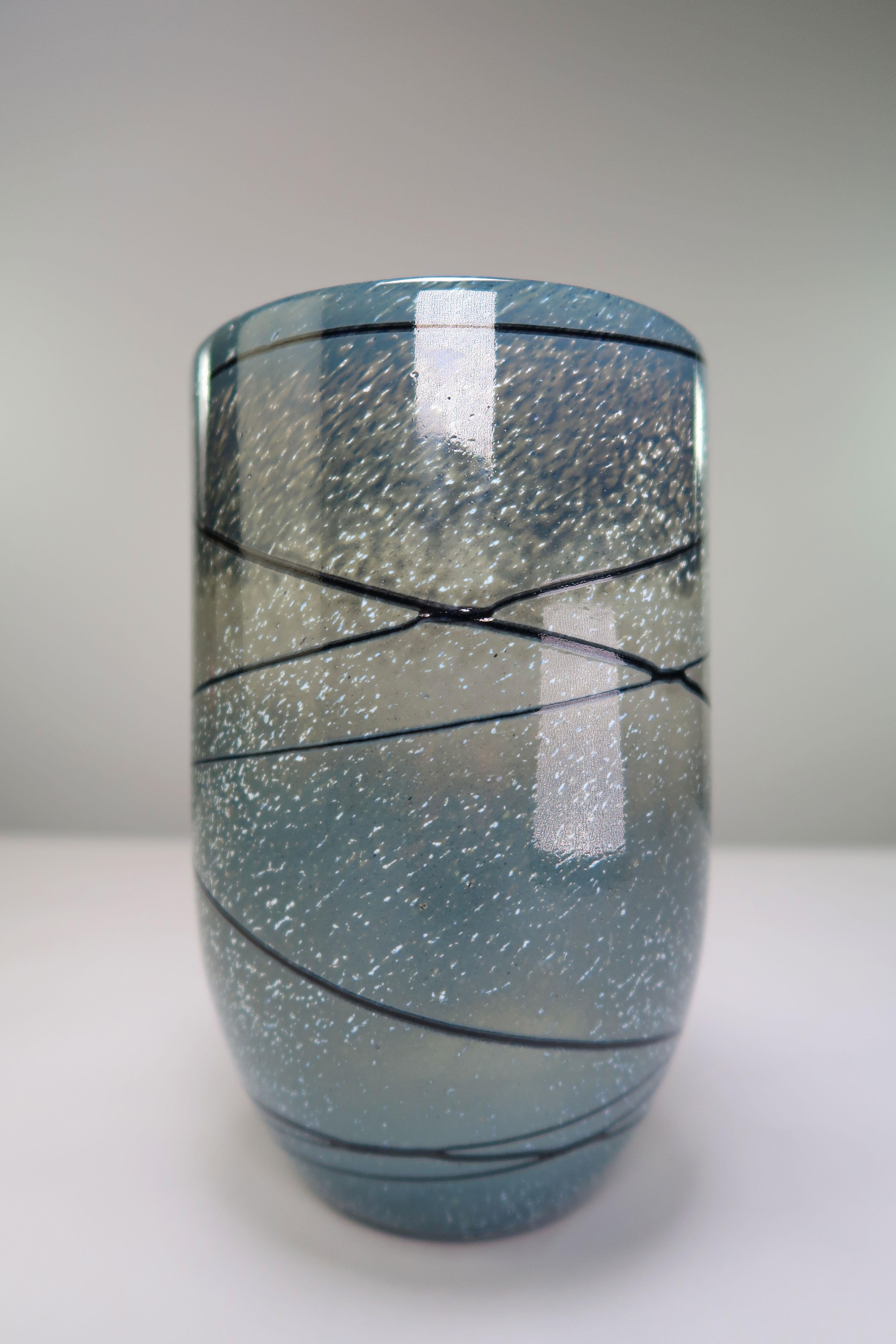 Vintage Finnish modernist crystal vase by designer Tuomo Heikkinen for Humppila Finland. Mould blown crystal glass. Blue and warm grey base with accents of white and light blue, black stripes and one red rectangular shaped figure on one side.