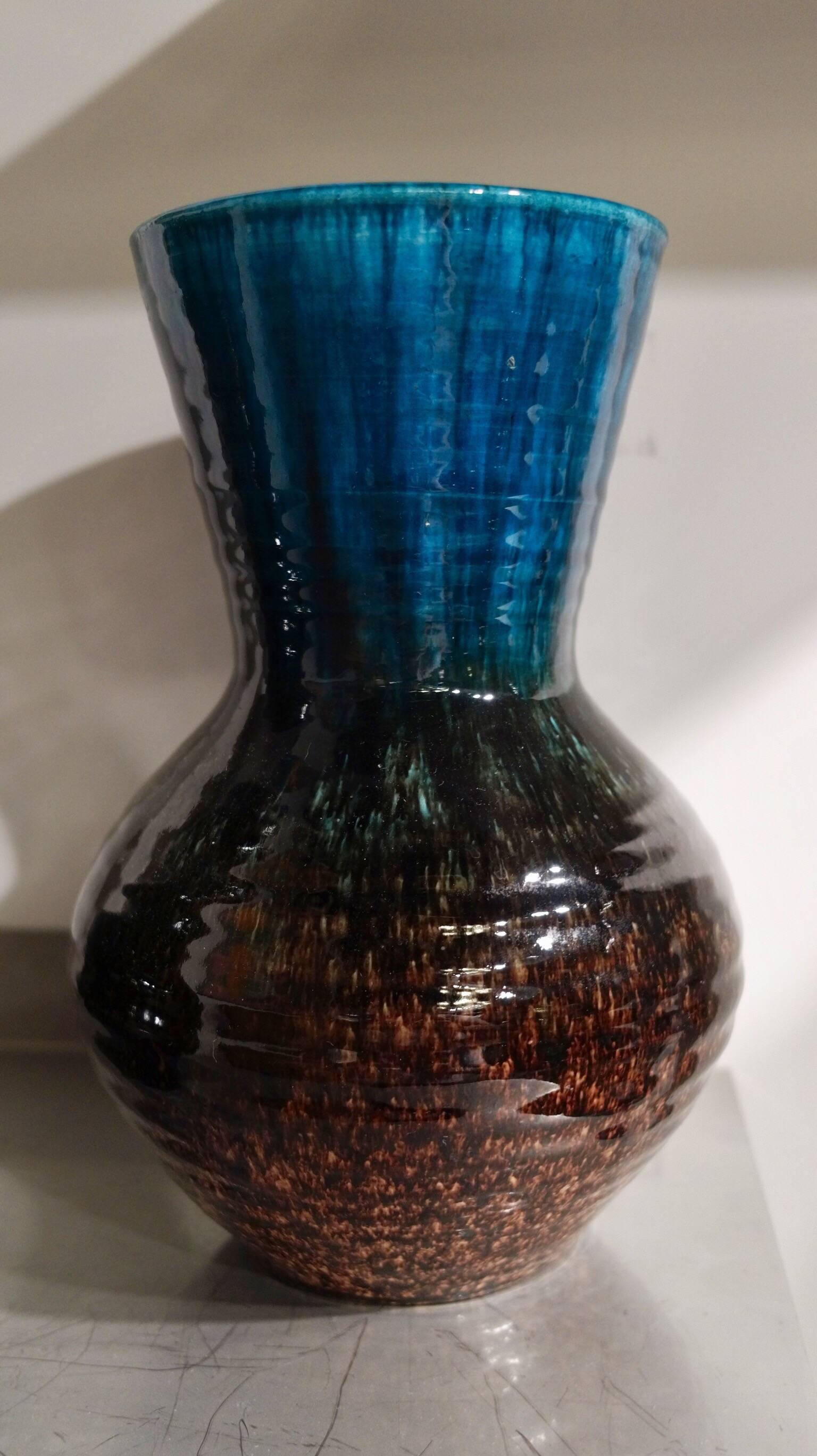 Blue and Bordeaux brown pair of enamelled ceramic vases by Accolay pottery, circa 1950.
Fantastic glaze.
In perfect condition.
Both signed under the base: 