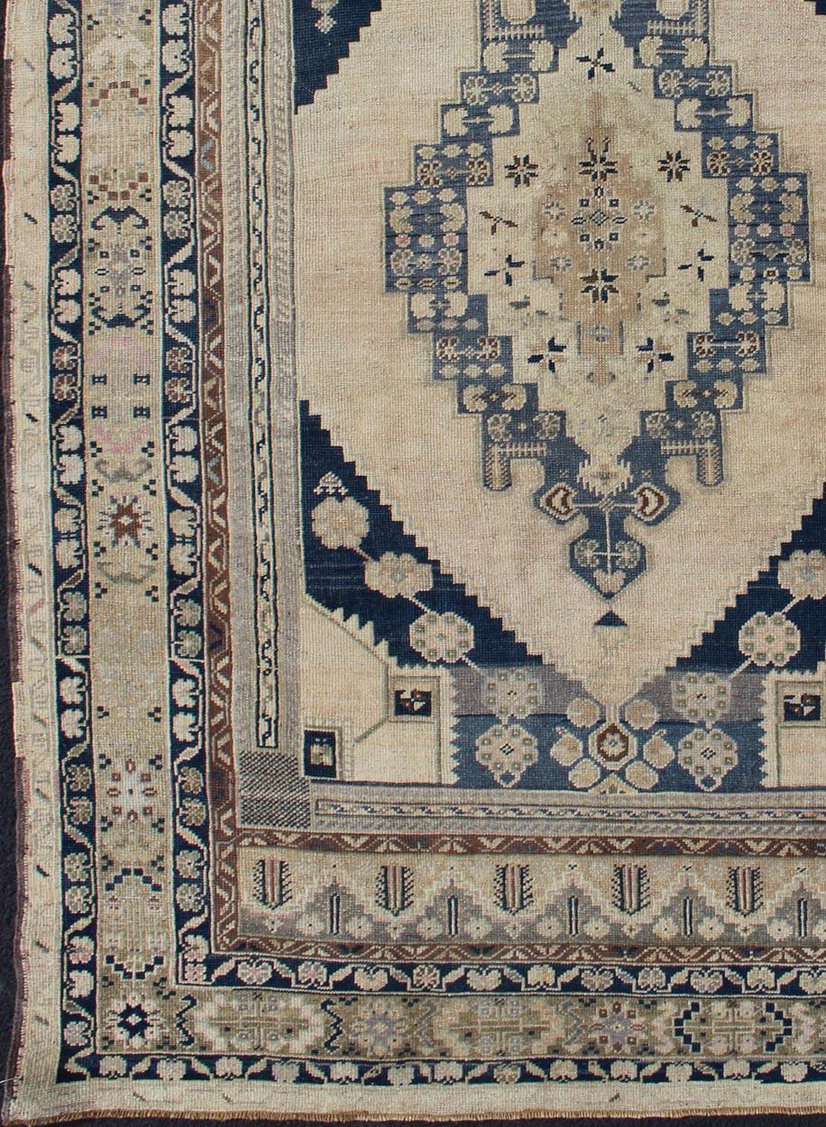 Blue, Brown, and Cream Turkish Oushak Rug Vintage with Medallion Design In Good Condition For Sale In Atlanta, GA