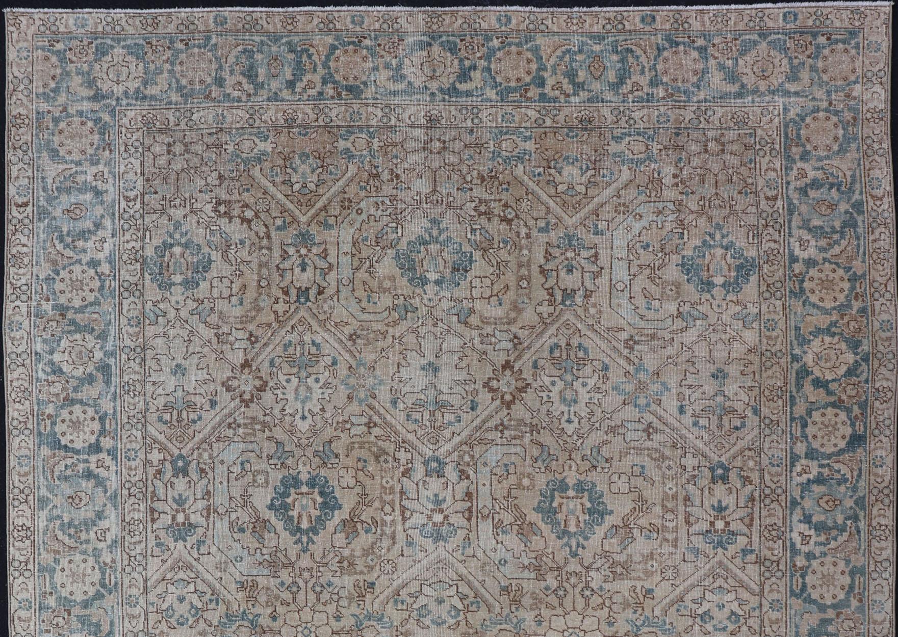 Tan background Persian Tabriz rug with geometric design, rug ZIR-65-KV-11, country of origin / type: Iran / Tabriz, circa 1930.

This magnificent early 20th century Persian Tabriz rug bears a beautiful, all-over sub-geometric floral design paired