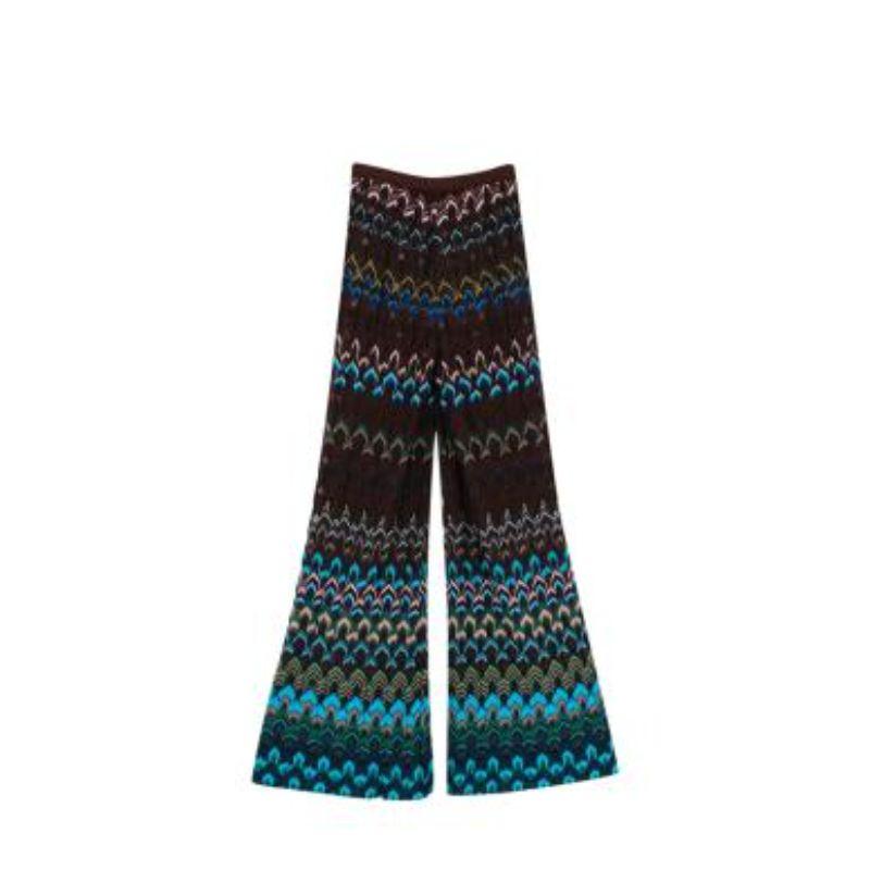 Missoni Blue & Brown Lurex Knitted Trousers
 

 - Signature zig-zag chevron knit in tones of brown and bright blue 
 - Wide, flared legs
 - Semi-sheer knit, with shorts lining 
 - Elasticated waistband 
 

 Materials
 72% Rayon 
 18% Cupro
 10%