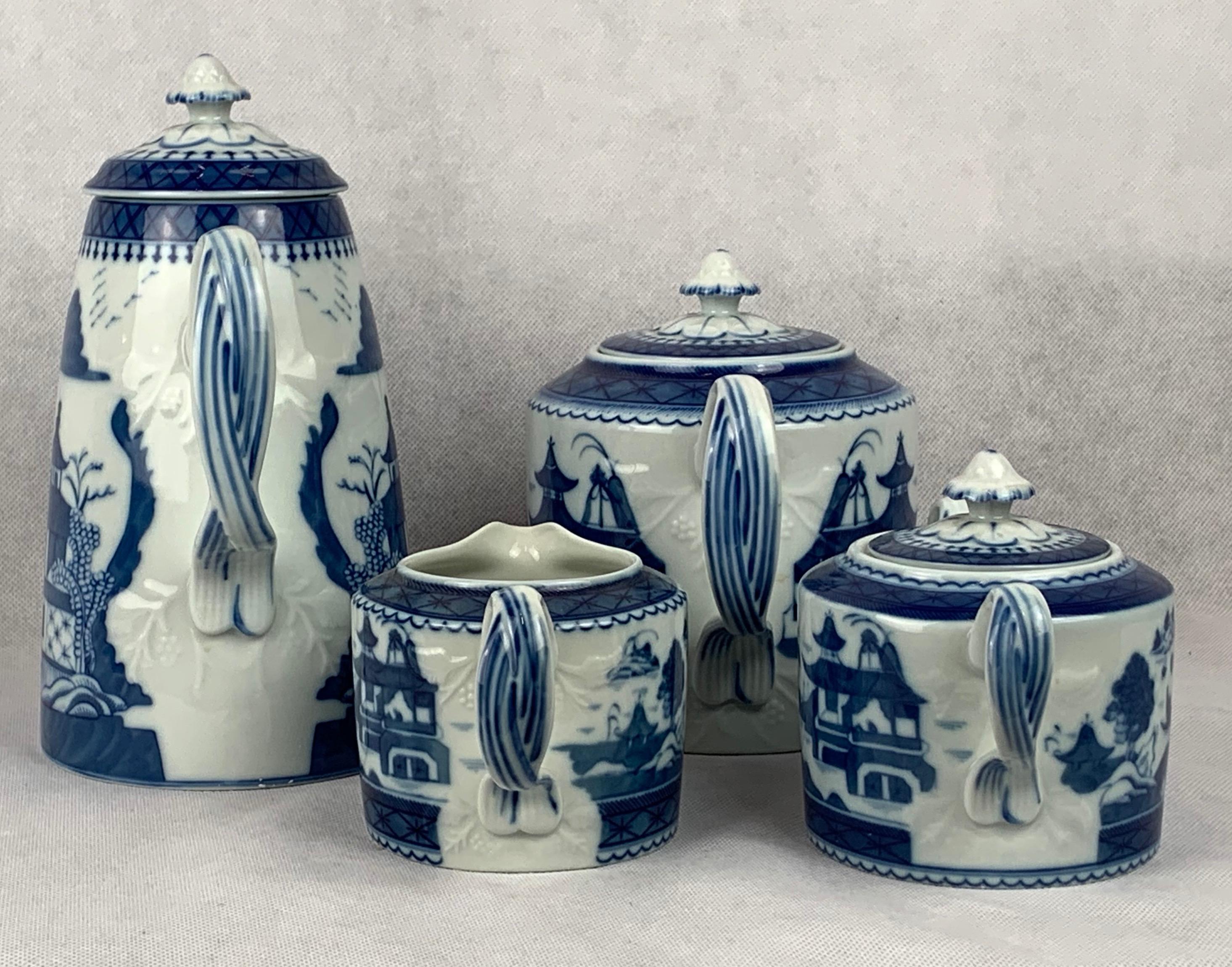 Blue Canton coffee, tea service by Vista Alegre for Mottahedeh. This porcelain set is in pristine condition and consists of a coffee pot with lid, a tea pot with lid, a sugar bowl with lid and a creamer. The pattern is after the famous Canton