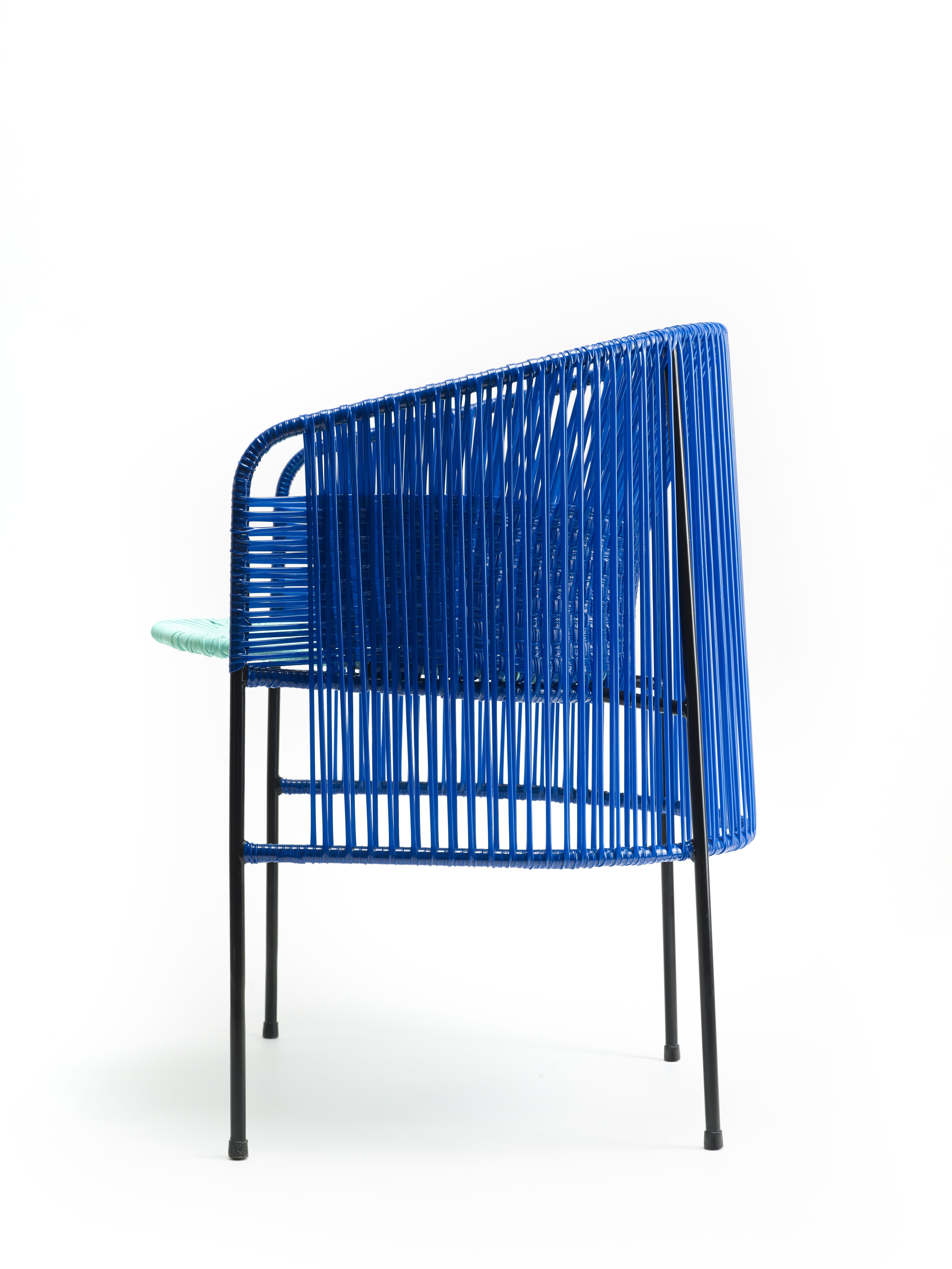 German Blue Caribe Lounge Chair by Sebastian Herkner