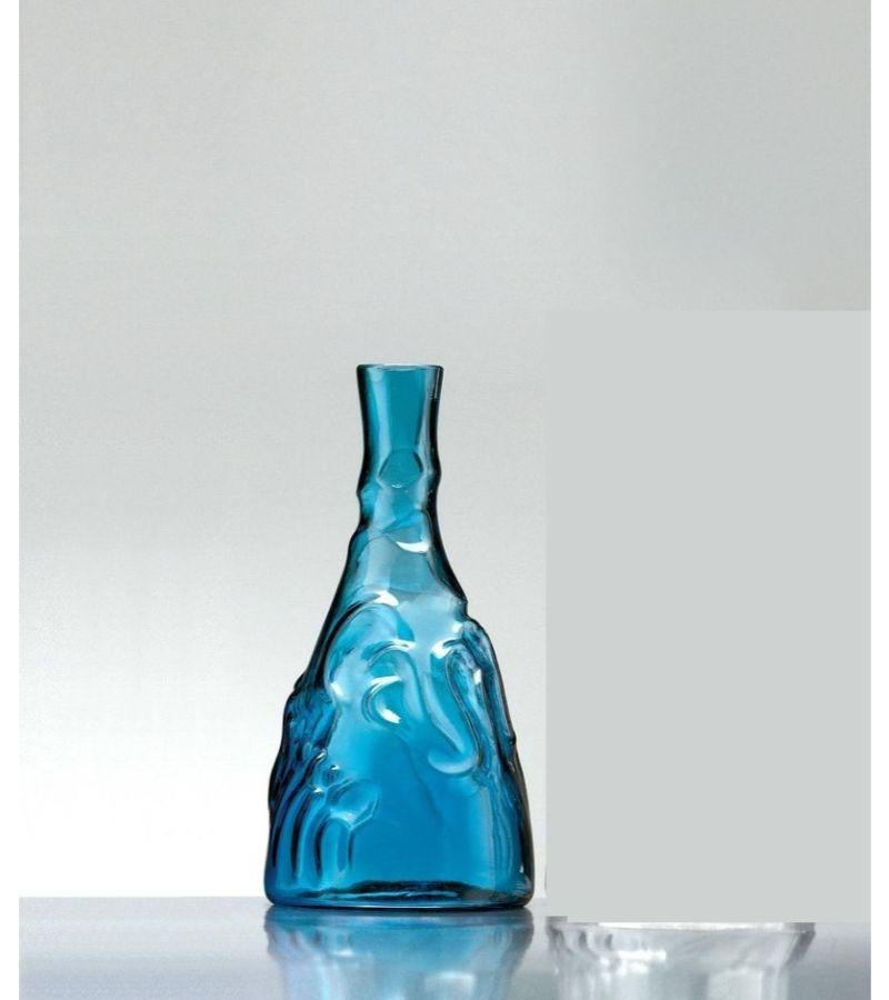 Blue Casa de Familia bottle by Josep Maria Jujol
Dimensions: Diameter 13 x H 27 cm 
Materials: Glass. 
Also available in clear glass.


He designed the Casa de Familia Bottle in 1912, and more than a century later it’s still going strong. The