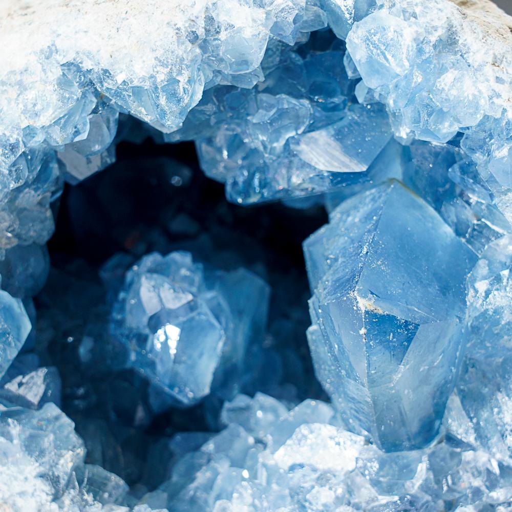 This unique Madagascan Blue Celestite Cluster exhibits large, gem crystals of remarkable quality, featuring prism faces and sharp chisel-terminations - surpassing the average blue-grey grains from the region. All shiny crystals are glassy and boast