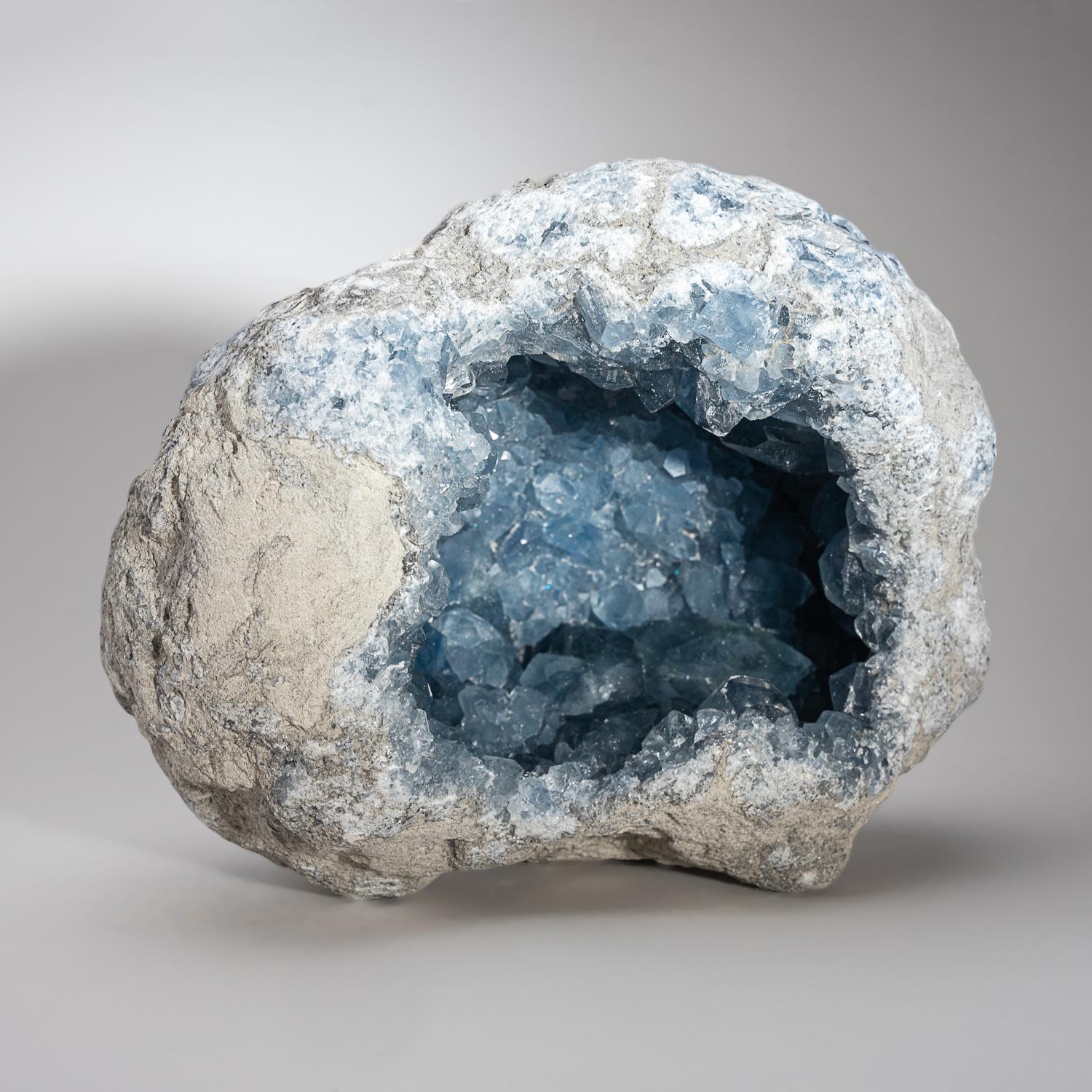Lustrous large gem transparent crystals of blue Celestite. Has a few large crystals with prism faces and chisel-shaped terminations. This specimen has bright rich color, unlike the blueish grey color which is common from this region. All fully
