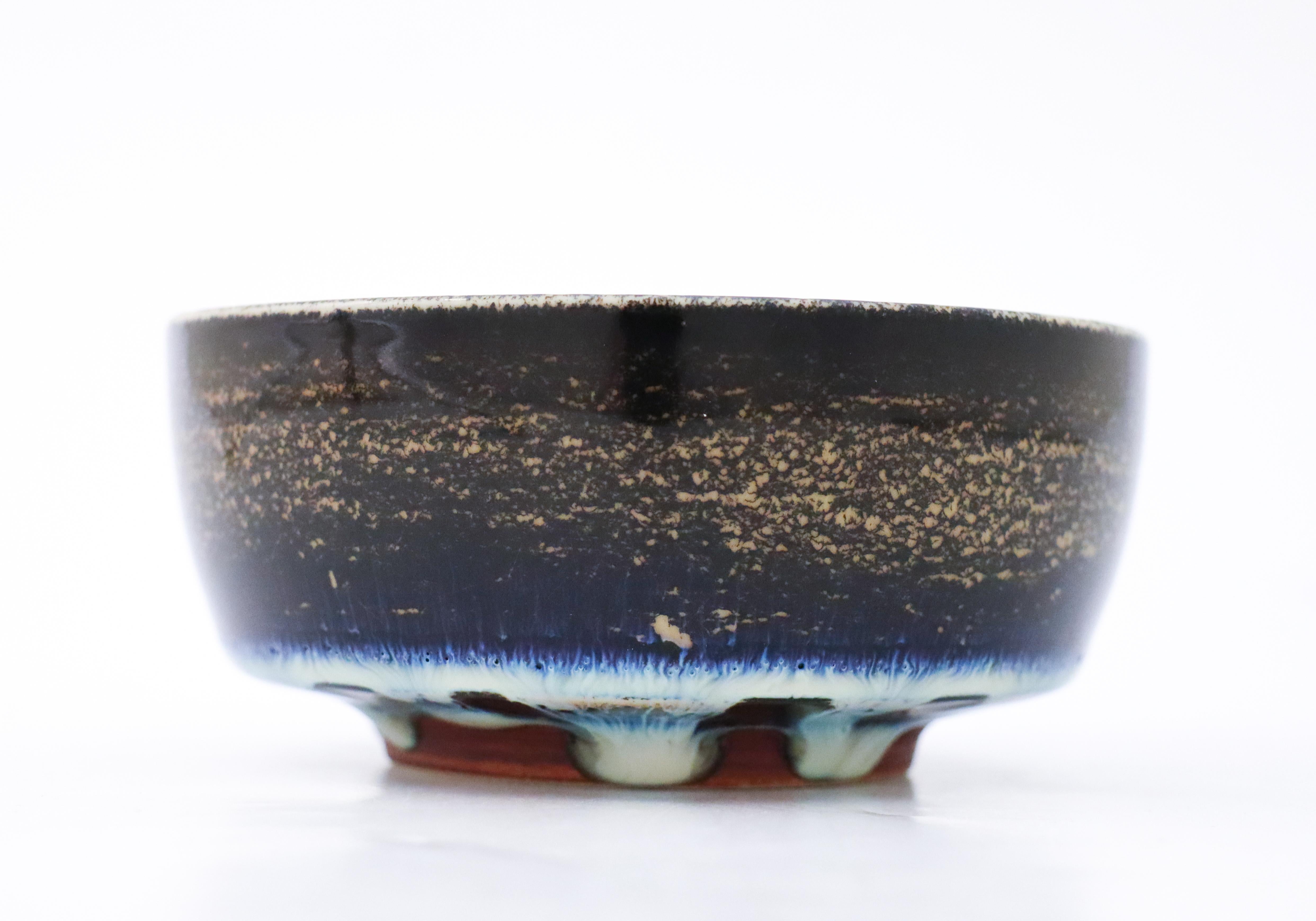 A lovely unique blue bowl designed by Carl-Harry Stålhane at Rörstrand, the bowl is 11.5 cm (4.6