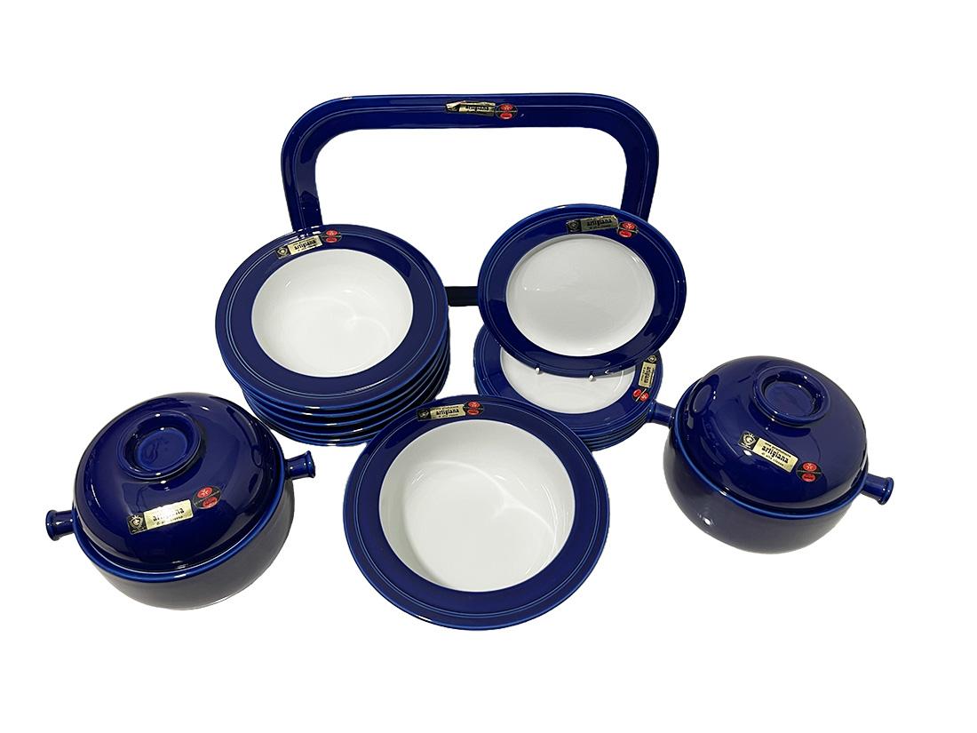 Blue Ceramic Franco Pozzi set, Italy, 1964

Italian ceramic set by Franco Pozzi, dated 1964. The mark labels are still on all items. Dark blue with white colored set, consists of a tray, a large bowl, 6 small bowls, 6 small plates and two tureens