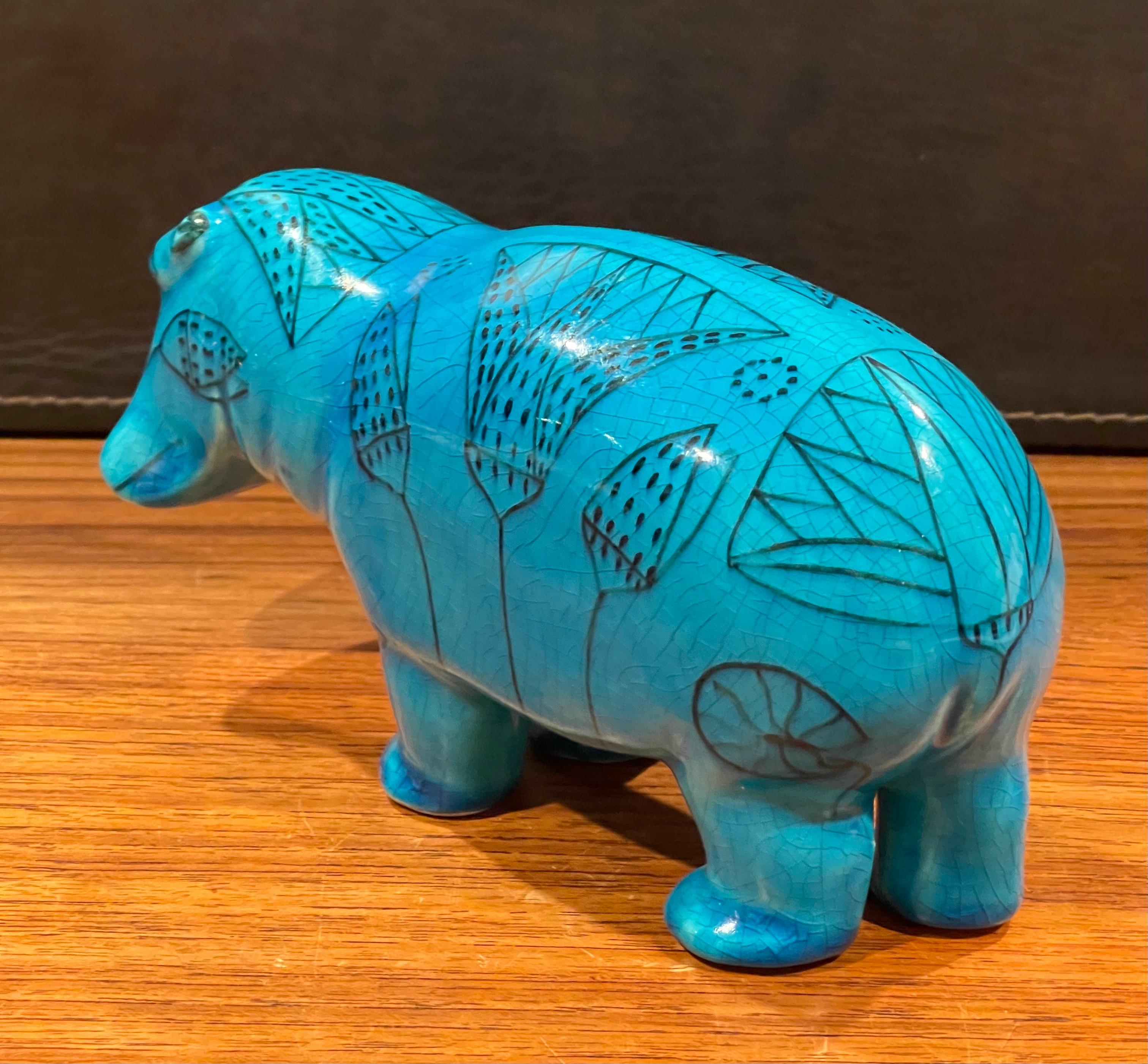 blue hippo sculpture