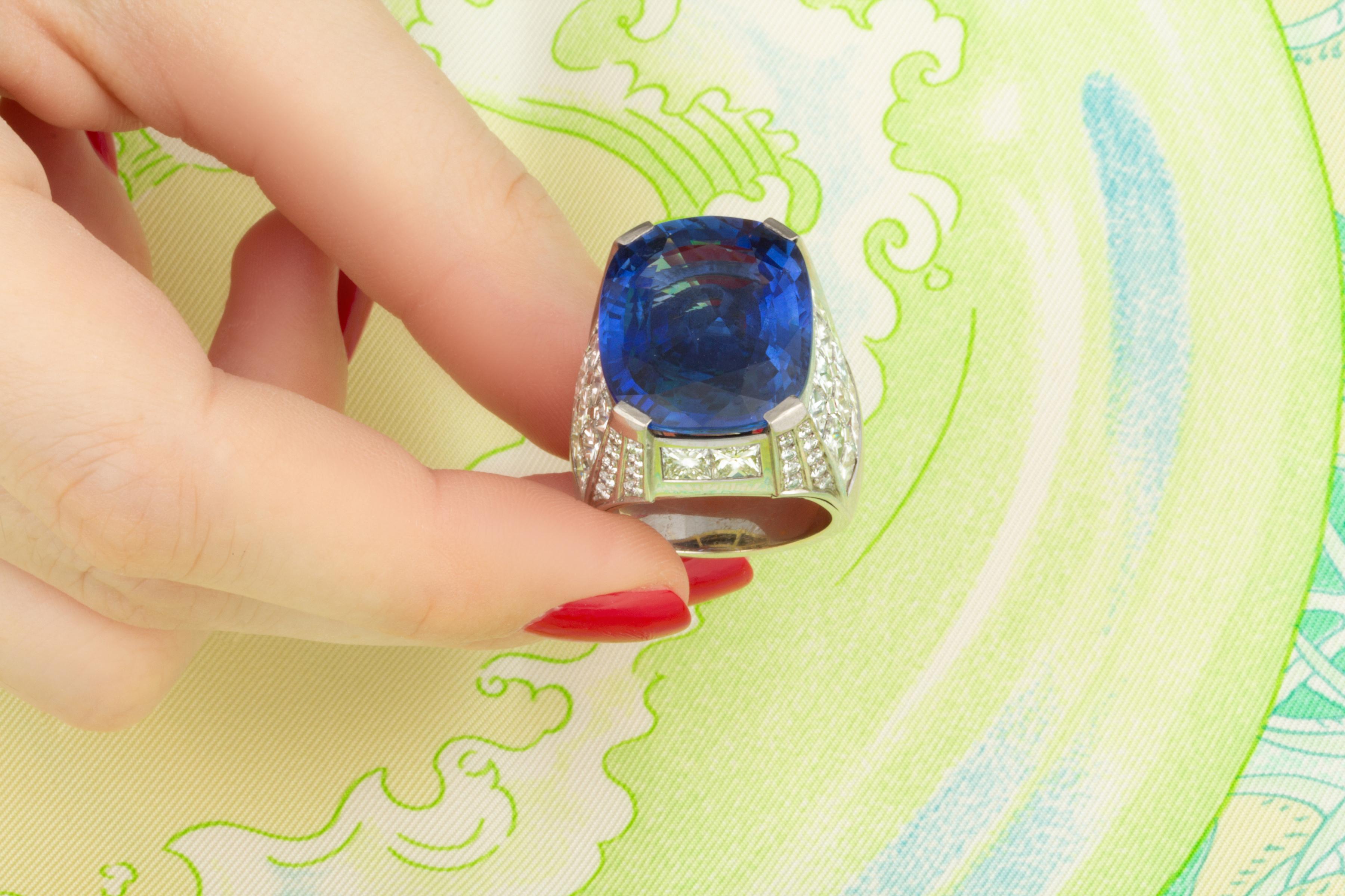 The blue Ceylon sapphire and diamond ring features a magnificent oval faceted 30 carat blue Ceylon sapphire of intense and crystalline “blu Madonna” color. (In reference to the marvelous blue typically used in Renaissance paintings). It is