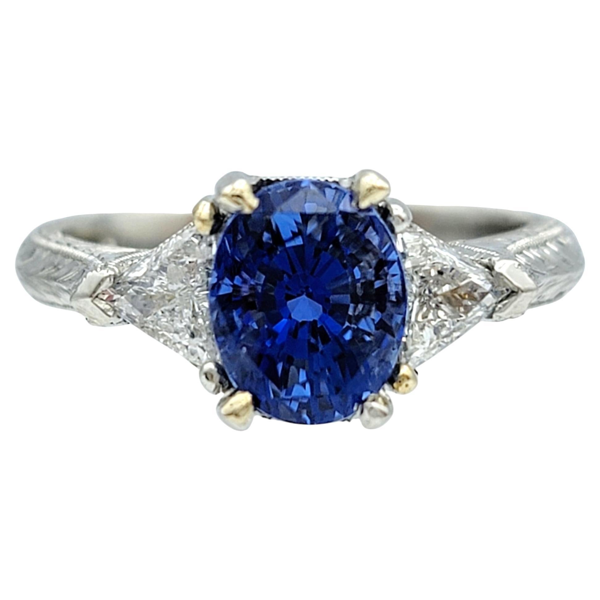Blue Ceylon Sapphire and Trillion Cut Diamond Three-Stone Ring in Platinum