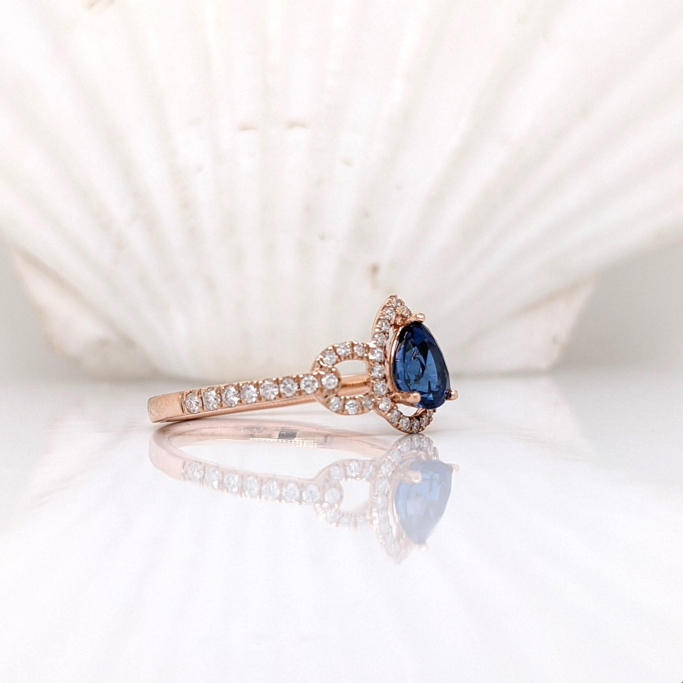 Stunning is an understatement for this ring! The all natural earth mined diamond halo and accents perfectly emphasize the vivid blue in this sapphire from Ceylon. The halo design gives a slightly vintage feel but in the most elegant