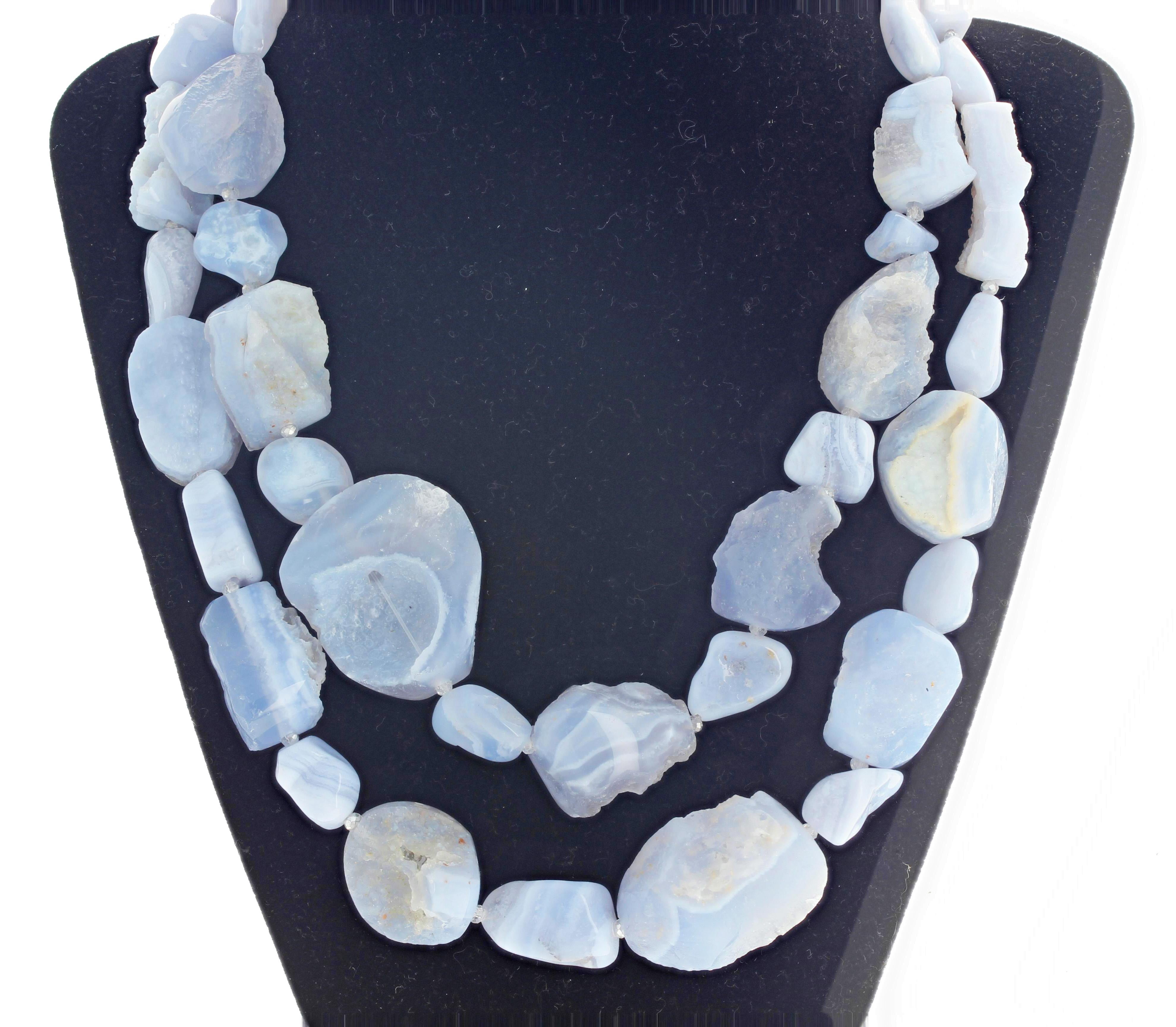 Beautiful soft blue natural real stunning Chalcedony polished rocks compose this 17 inch long double strand necklace accented with sparkling little crystals.  Largest stone is 35mm x 30 mm and the clasp on this fascinating unusual gemstone necklace