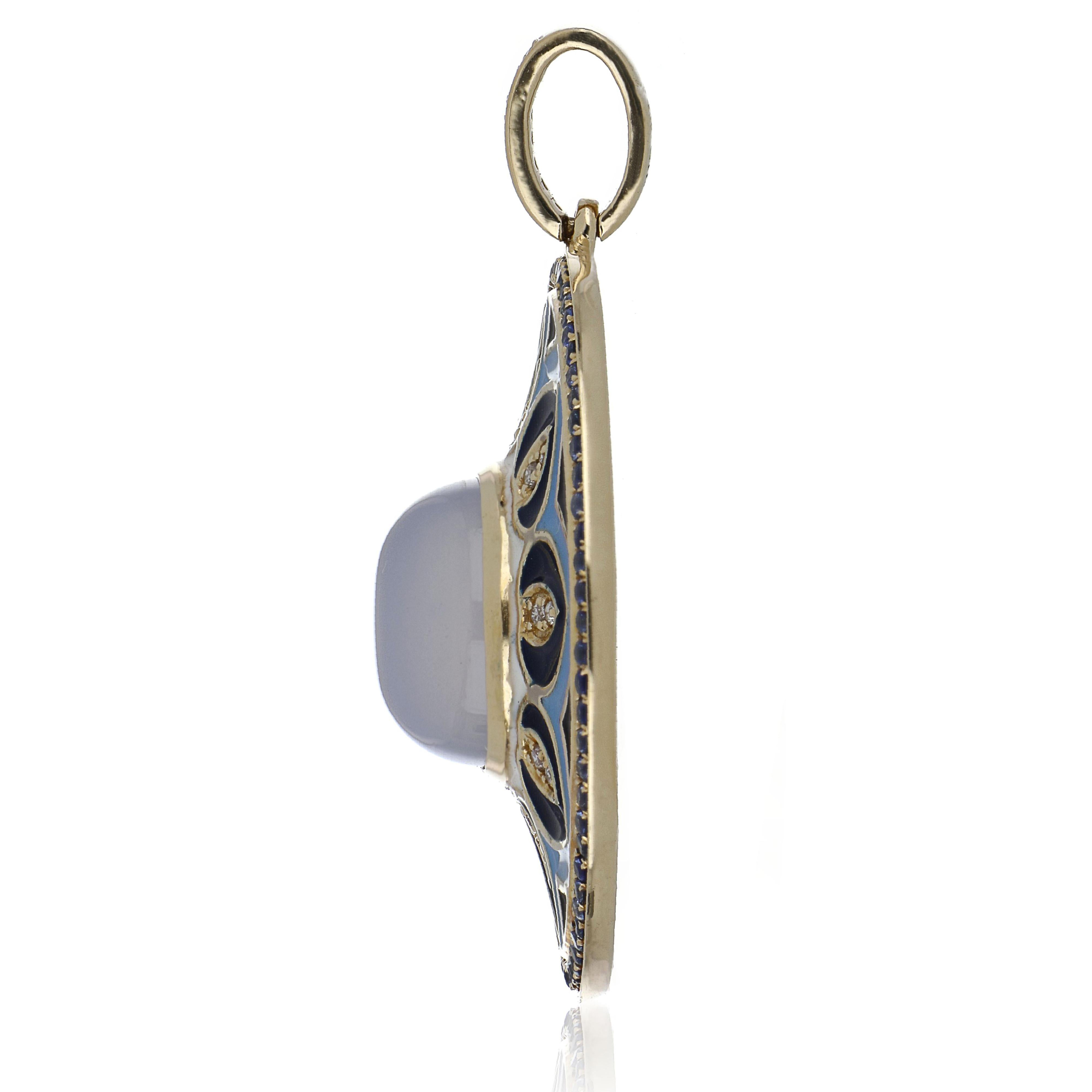 Elegant and exquisite Enamel Cocktail 14 K Pendant, center set with 4.10 Cts. Cabochon Cut Blue Chalcedony Round . Surrounded with Blue Sapphire Rounds 0.45 Cts. accented with Diamonds, weighing approx. 0.09 Cts. Beautifully Hand crafted in 14 Karat