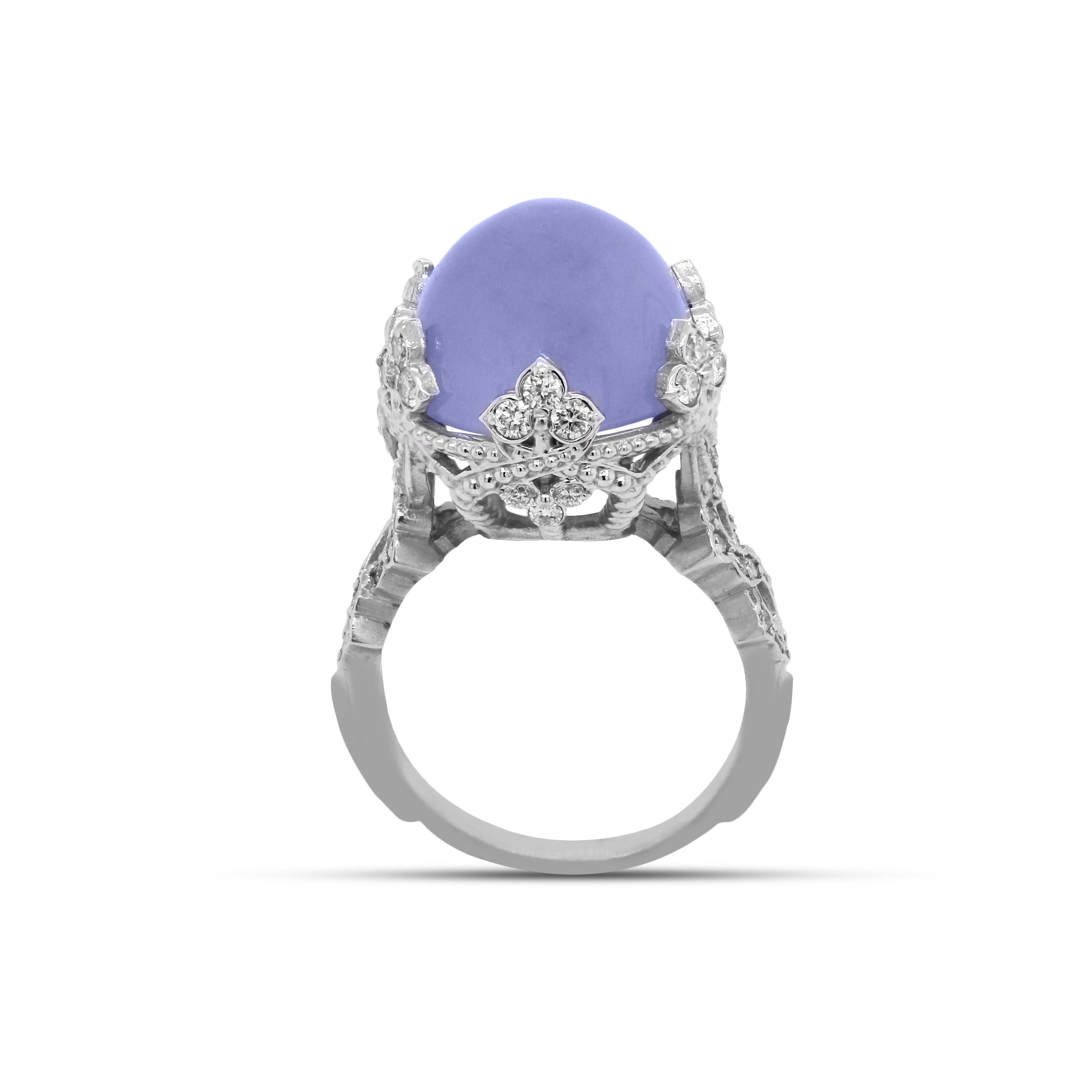 18K White Gold and Diamond Cocktail Ring with Blue Chalcedony center by Stambolian

A unique and everyday ring with all things curve and symmetry. The center Chalcedony is so vibrant in color and goes beautifully with the white gold. (This ring is