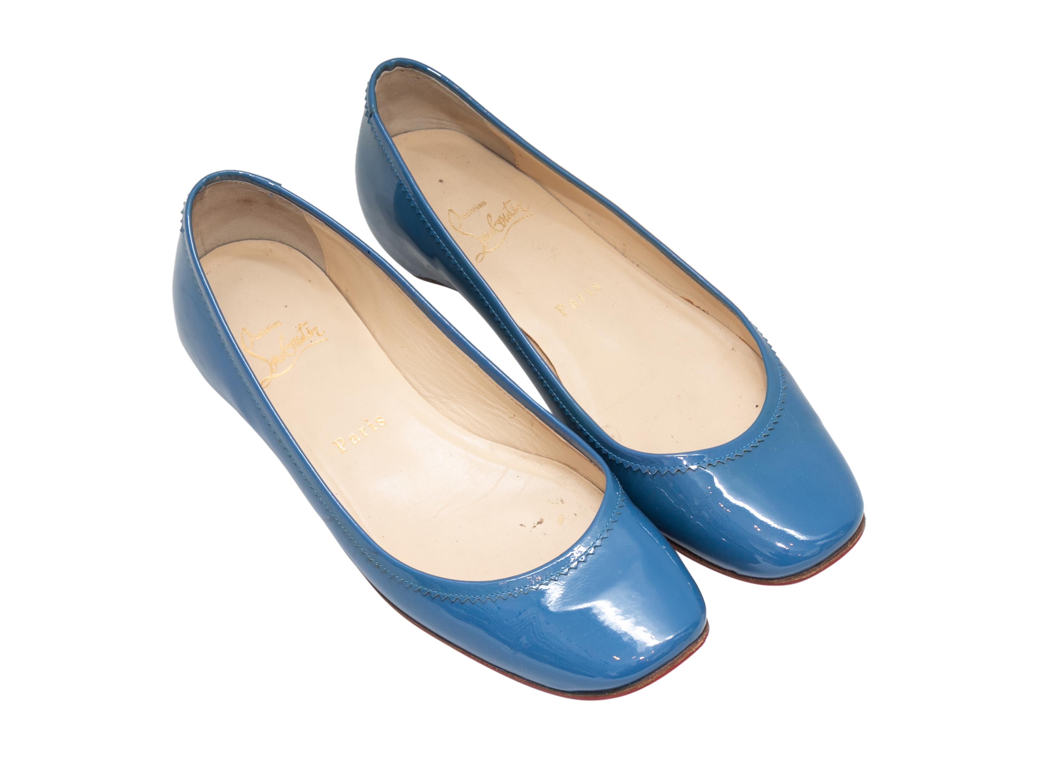 Blue patent leather ballet flats by Christian Louboutin.

Designer Size: 37
US Recommended Size: 7