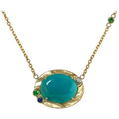 Blue Chrysocolla 14 Karat Gold Pendant with Green Garnets and Blue Sapphire