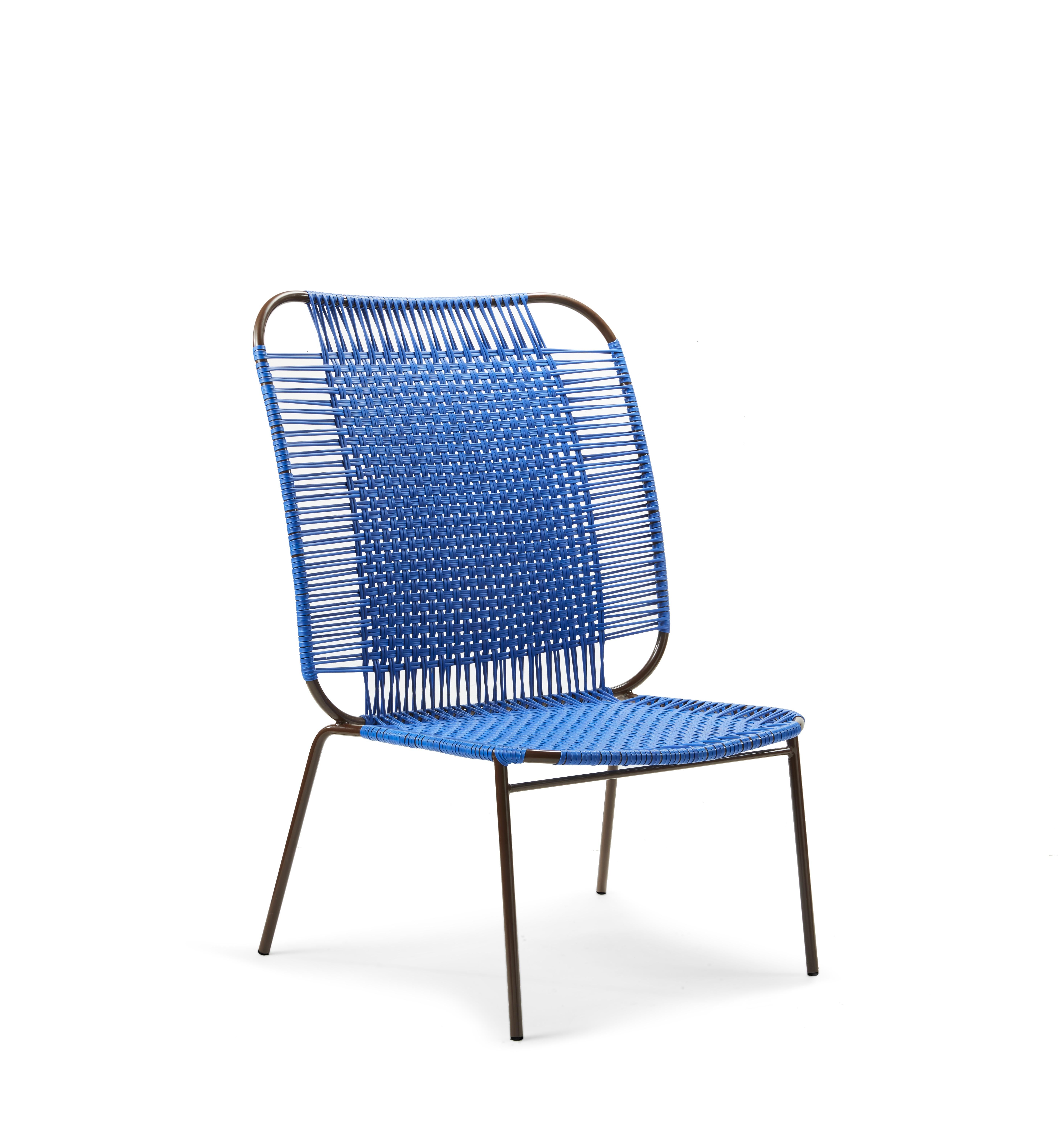Blue Cielo lounge high chair by Sebastian Herkner
Materials: Galvanized and powder-coated tubular steel. PVC strings are made from recycled plastic.
Technique: Made from recycled plastic and weaved by local craftspeople in Cartagena, Colombia.